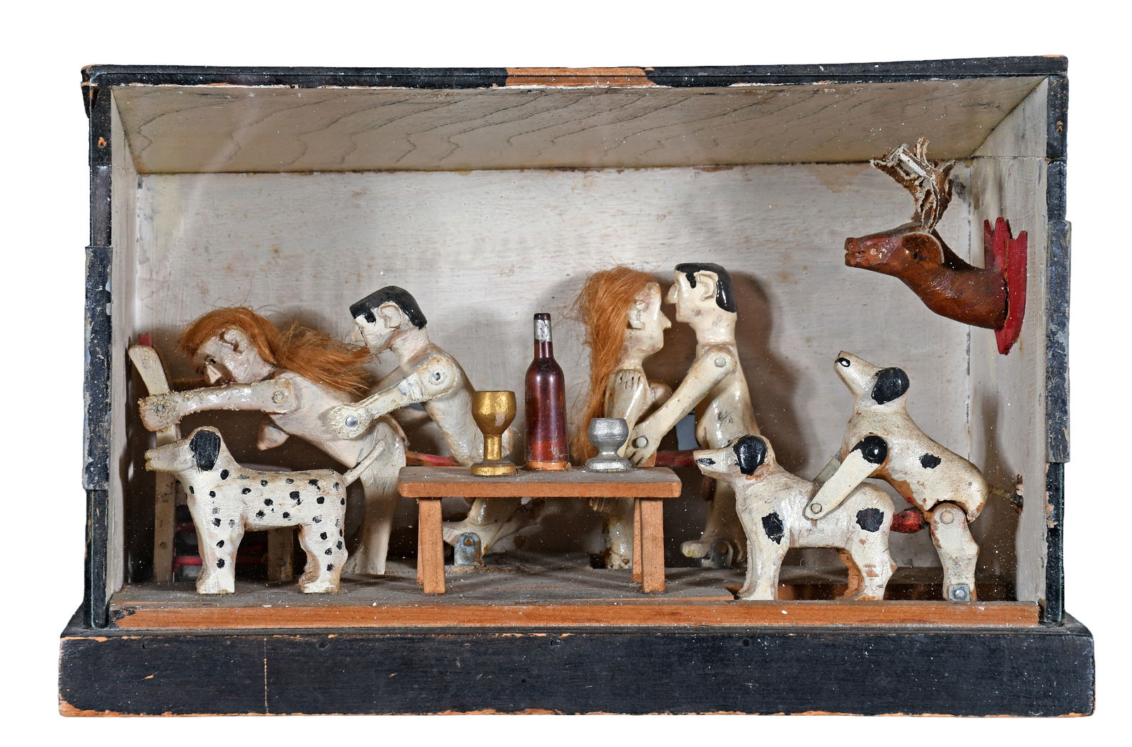 Multi-Figure Erotic Kinetic Diorama In Box.: Anonymous. Multi-Figure Erotic Kinetic Diorama In Box. c. 1930-40's. Very funny. Carved and painted figures with moving parts. Mixed media construction. Excellent condition. 11" w x 7" h x 5" d. Est.