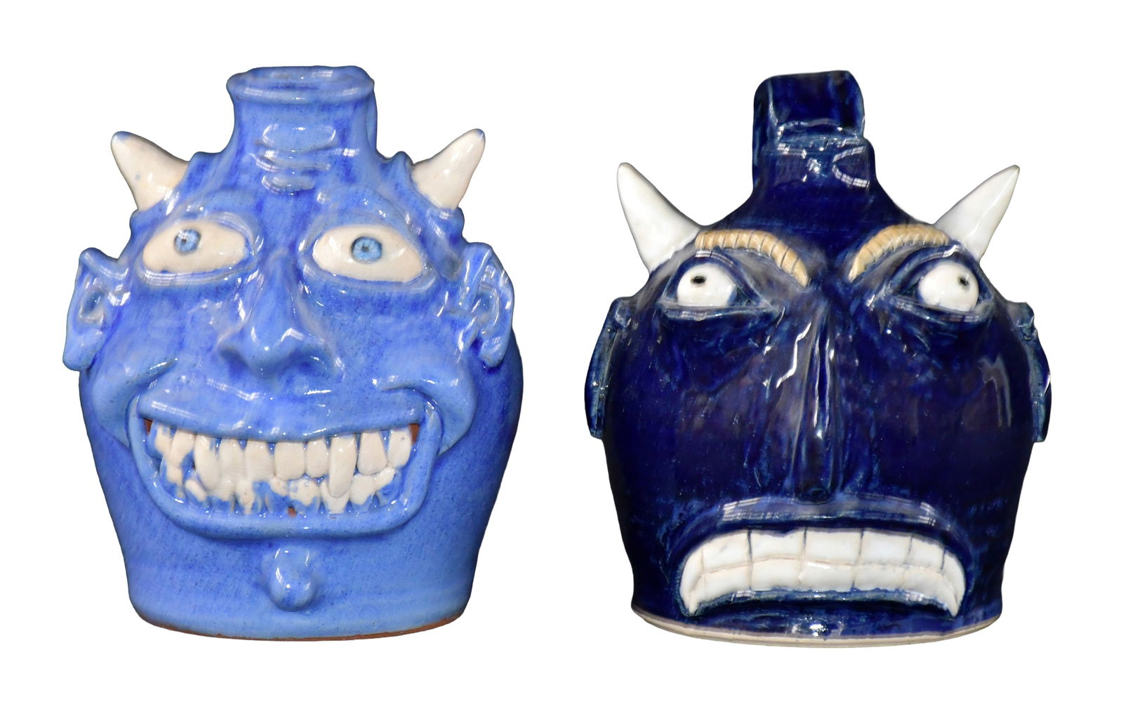 Stacy Lambert and Bean. Pair of Mini Blue Devil Face Jugs.: Stacy Lambert and Bean. Pair of Mini Blue Devil Face Jugs. c. 2000. Mint condition. 5.5" h average. Est. $100-200. Ship: $55 Please Read Before You Bid: By registering for and/or placing a bid in