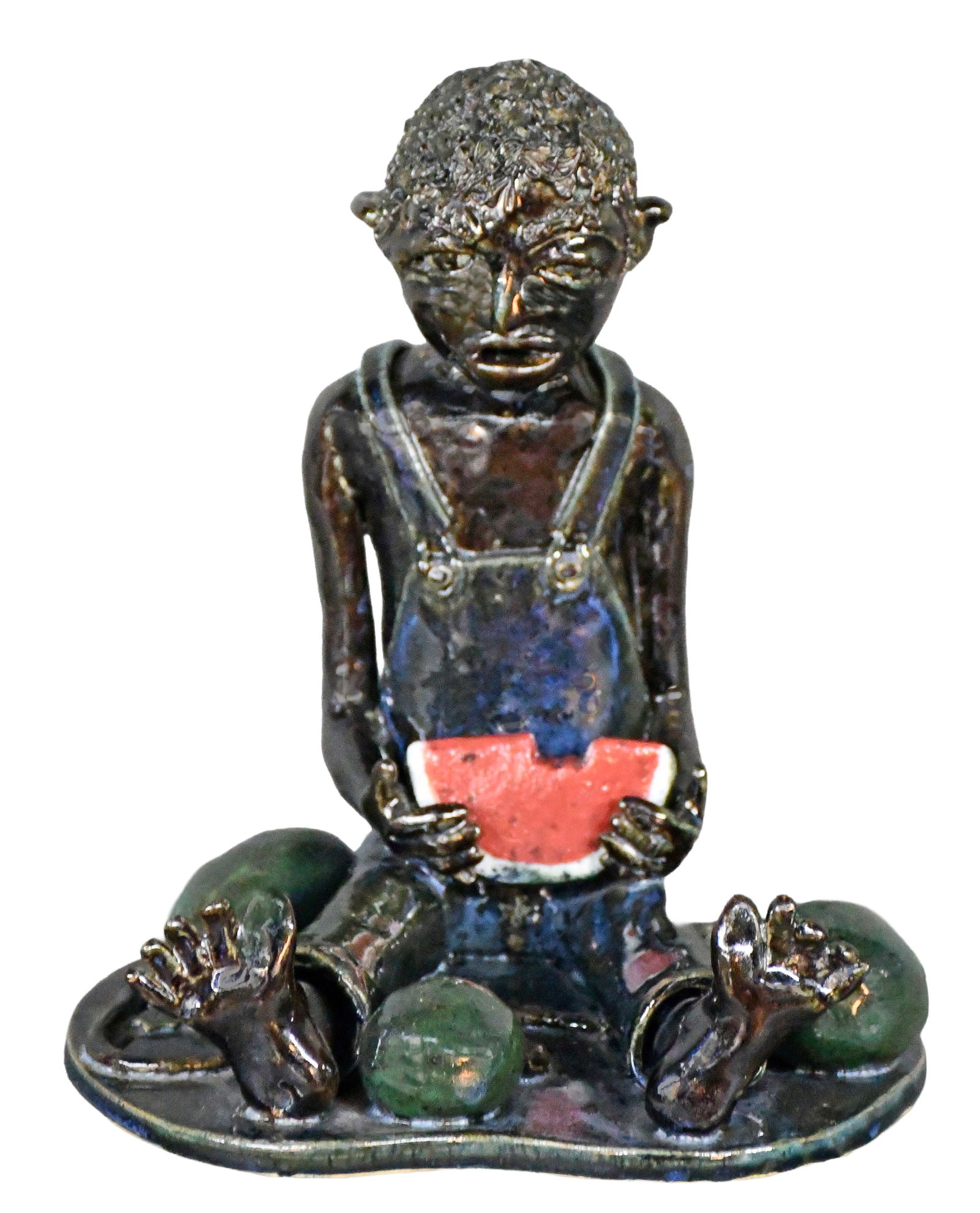 Lin Craven. Figural Sculpture Eating Watermelon.: Lin Craven. Figural Sculpture Eating Watermelon. 2001. Signed and dated. Mint condition. 10" h. Est. $200-400. Ship: $85 Please Read Before You Bid: By registering for and/or placing a bid in any