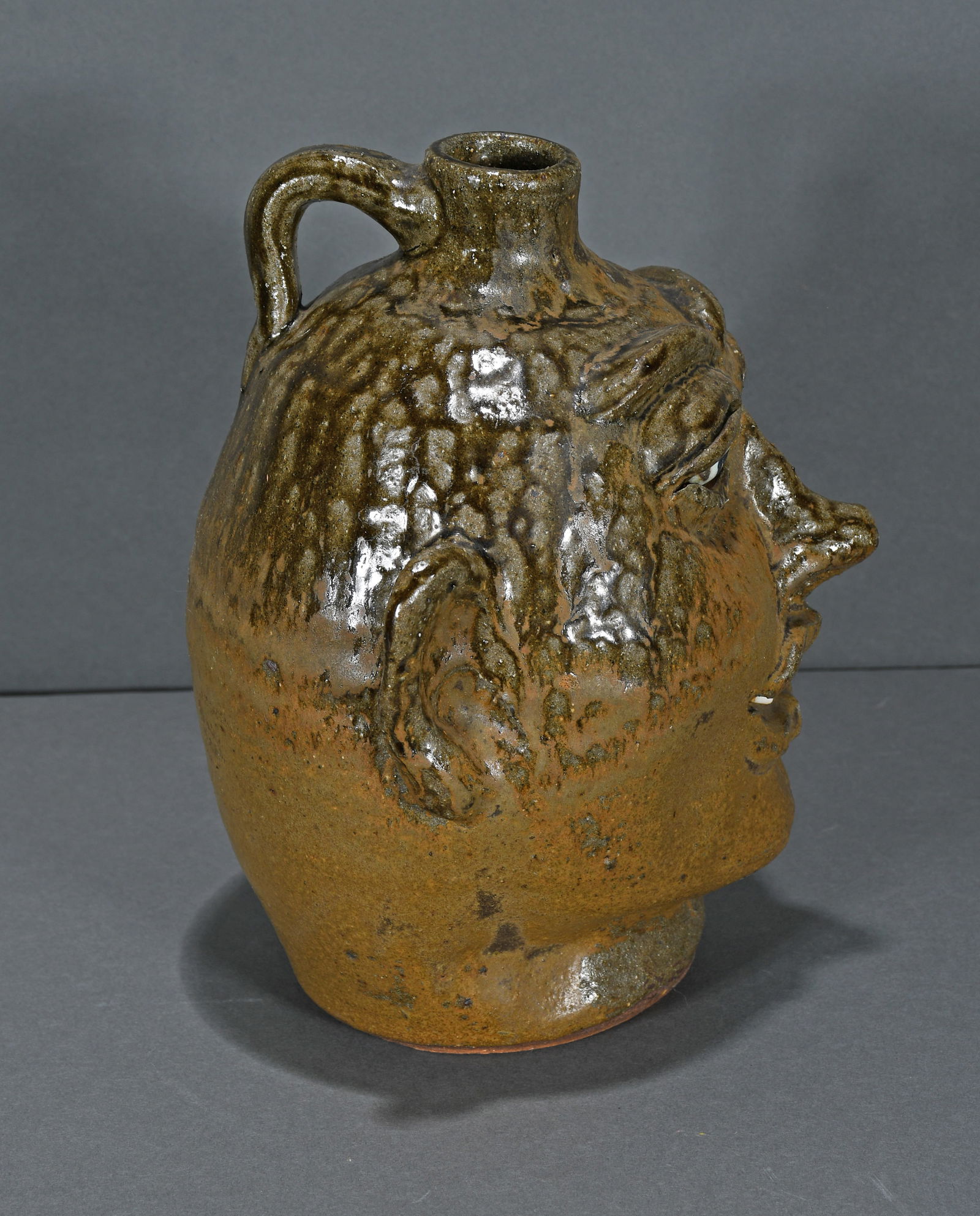 Lanier Meaders. Gap Tooth Face Jug. - 2