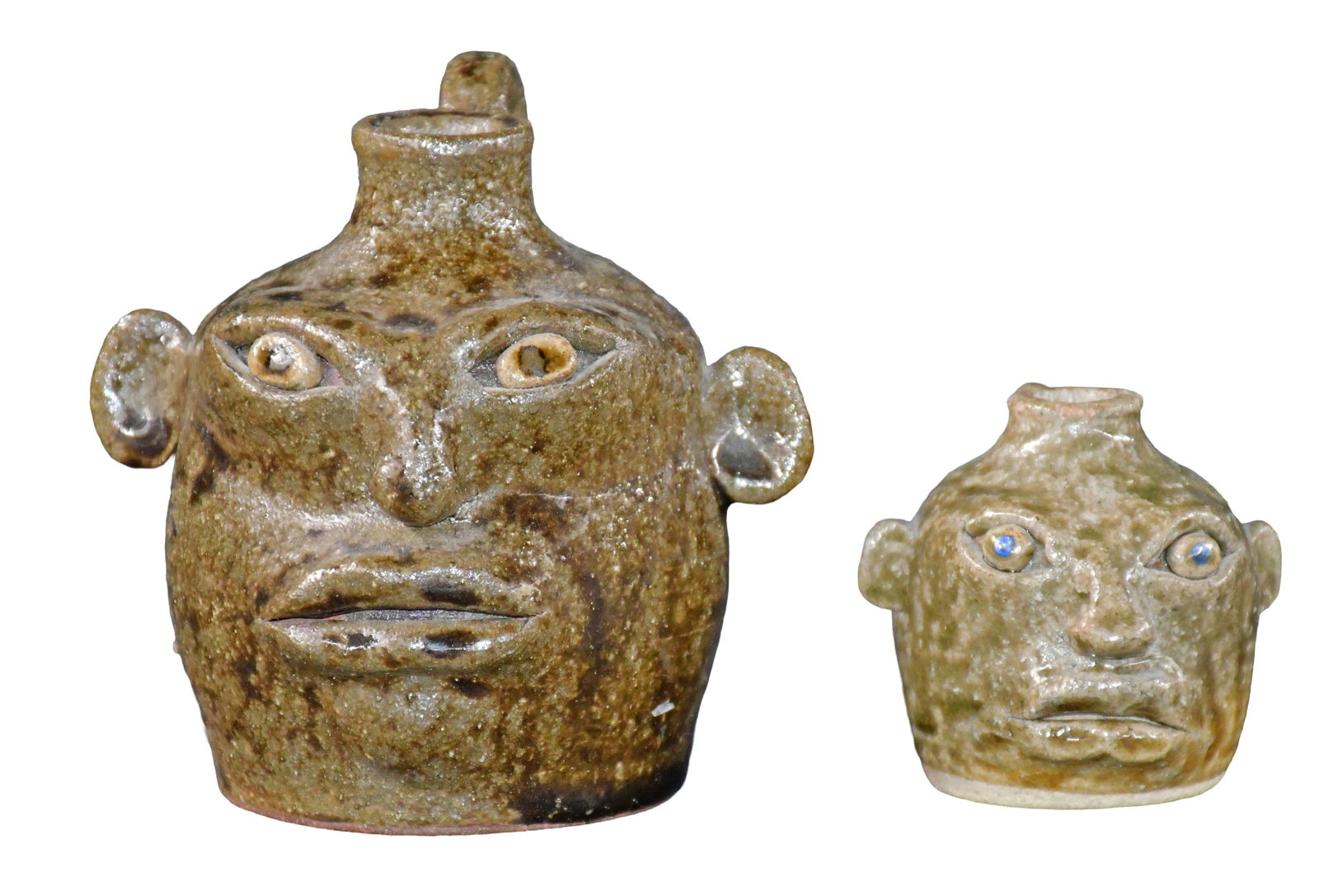 Anita Meaders. Pair of Mini Face Jugs.: Anita Meaders. Pair of Mini Face Jugs. Signed. Mint condition. Largest is 4.5" h. Est. $100-200. Ship: $45 Please Read Before You Bid: By registering for and/or placing a bid in any Slotin