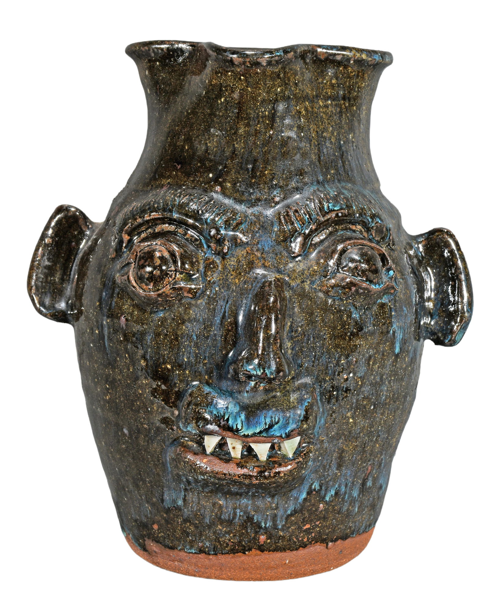 B.B. Craig. Early Face Pitcher.: B.B. Craig. Early Face Pitcher. Stamped. Dark ash glaze with routille drips and triangle teeth. Mint condition. 11" h. Est. $800-1,200. Ship: $55 Please Read Before You Bid: By registering for and/or