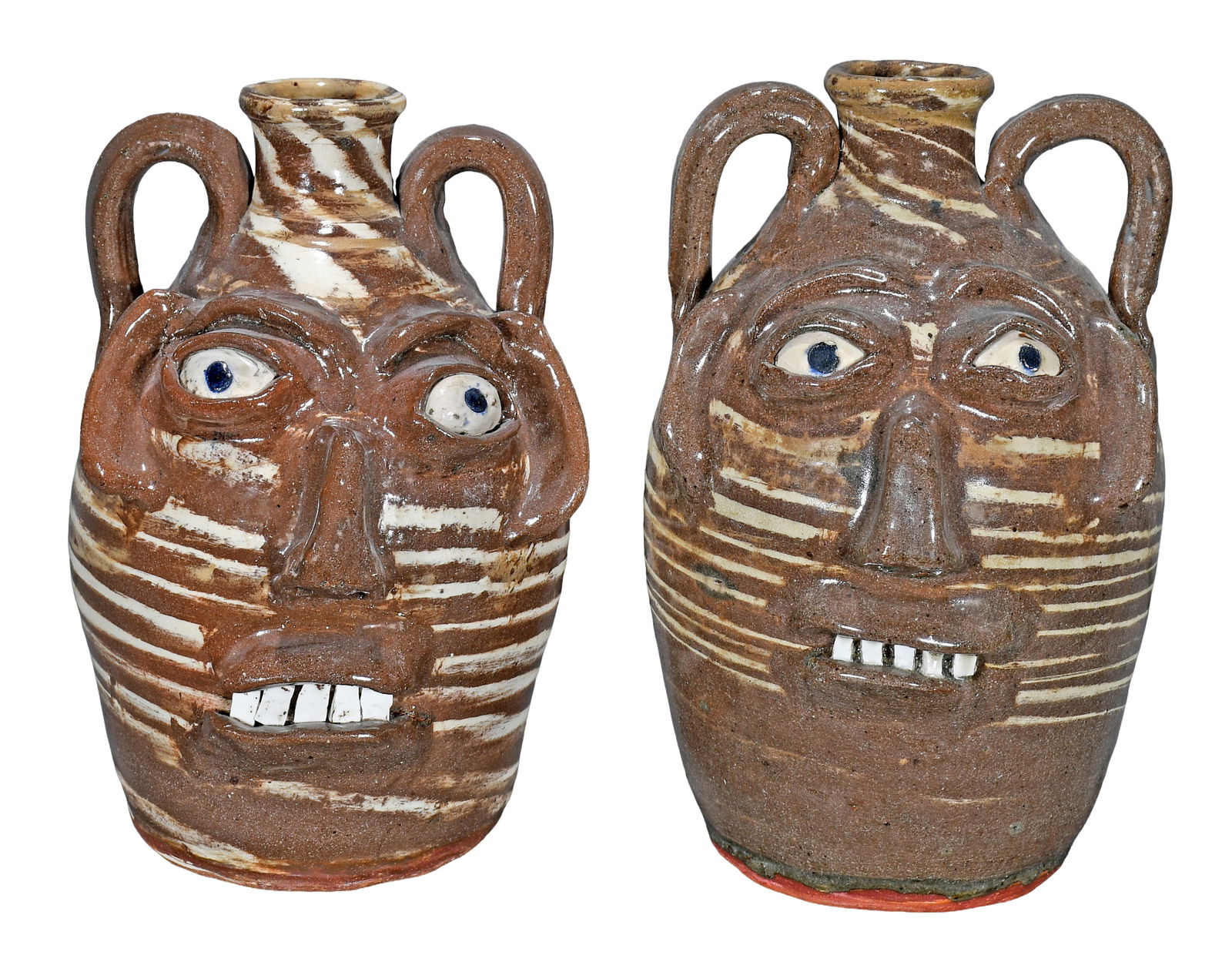 B.B. Craig. Pair of Swirl Face Jugs. (1 of 4)