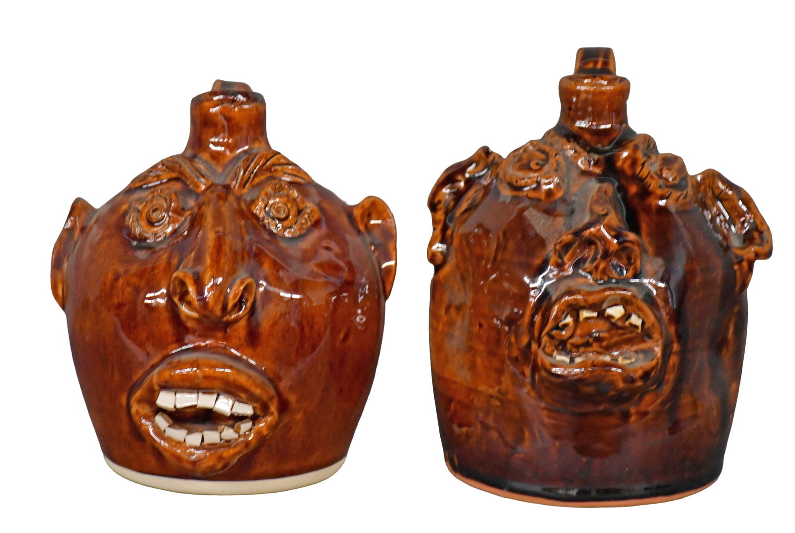 Charlie Brown. Pair of Traditional Half Gallon Face Jugs. (1 of 5)