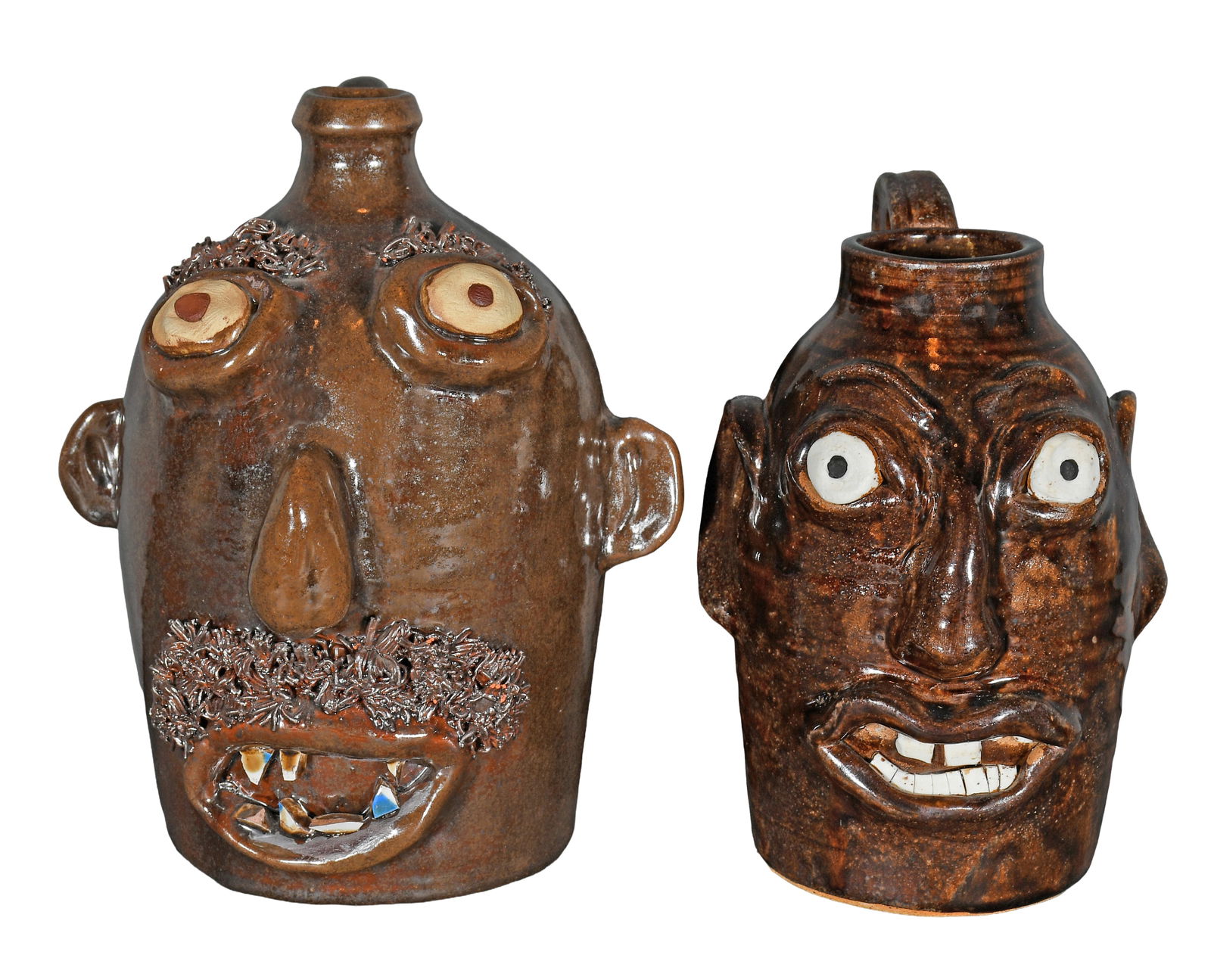 Seagrove. Pair of Face Jugs.: Seagrove. Pair of Face Jugs. 1996. Signed and dated. Mint condition. Tallest is 10" h. Est. $100-300. Ship: $85 Please Read Before You Bid: By registering for and/or placing a bid in any Slotin