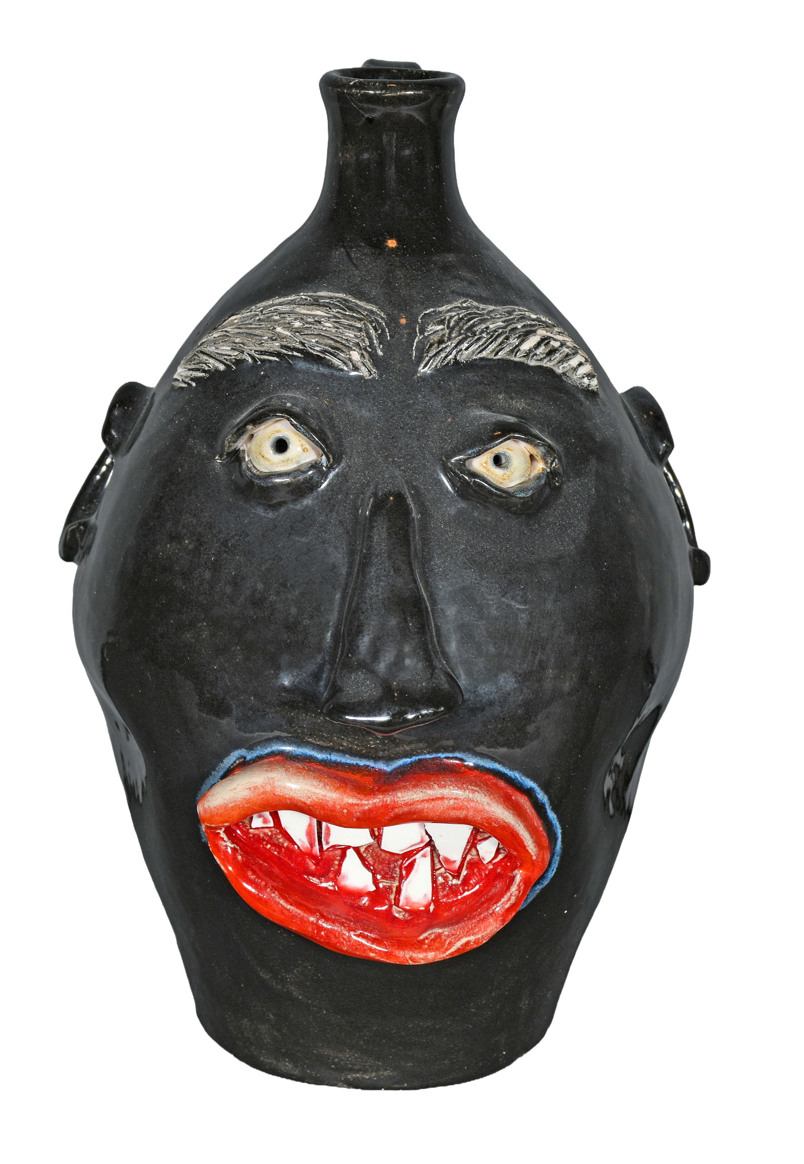 Claude Miller Ram Pottery. Black Glaze Face Jug.: Claude Miller Ram Pottery. Black Glaze Face Jug. Signed. Mint condition. 12" h. Est. $100-200. Ship: $55 Please Read Before You Bid: By registering for and/or placing a bid in any Slotin Auction,