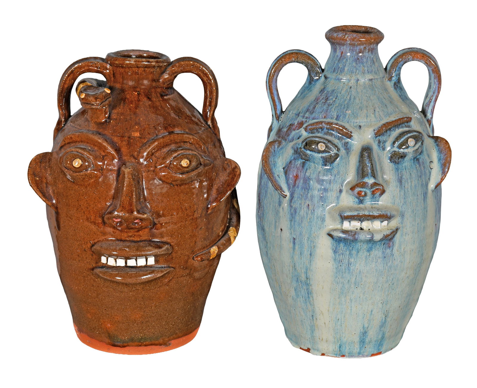 Walter Fleming. Pair of Face Jugs.: Walter Fleming. Pair of Face Jugs. One is signed. Mint condition. Tallest is 13" h. Est. $200-300. Ship: $100 Please Read Before You Bid: By registering for and/or placing a bid in any Slotin