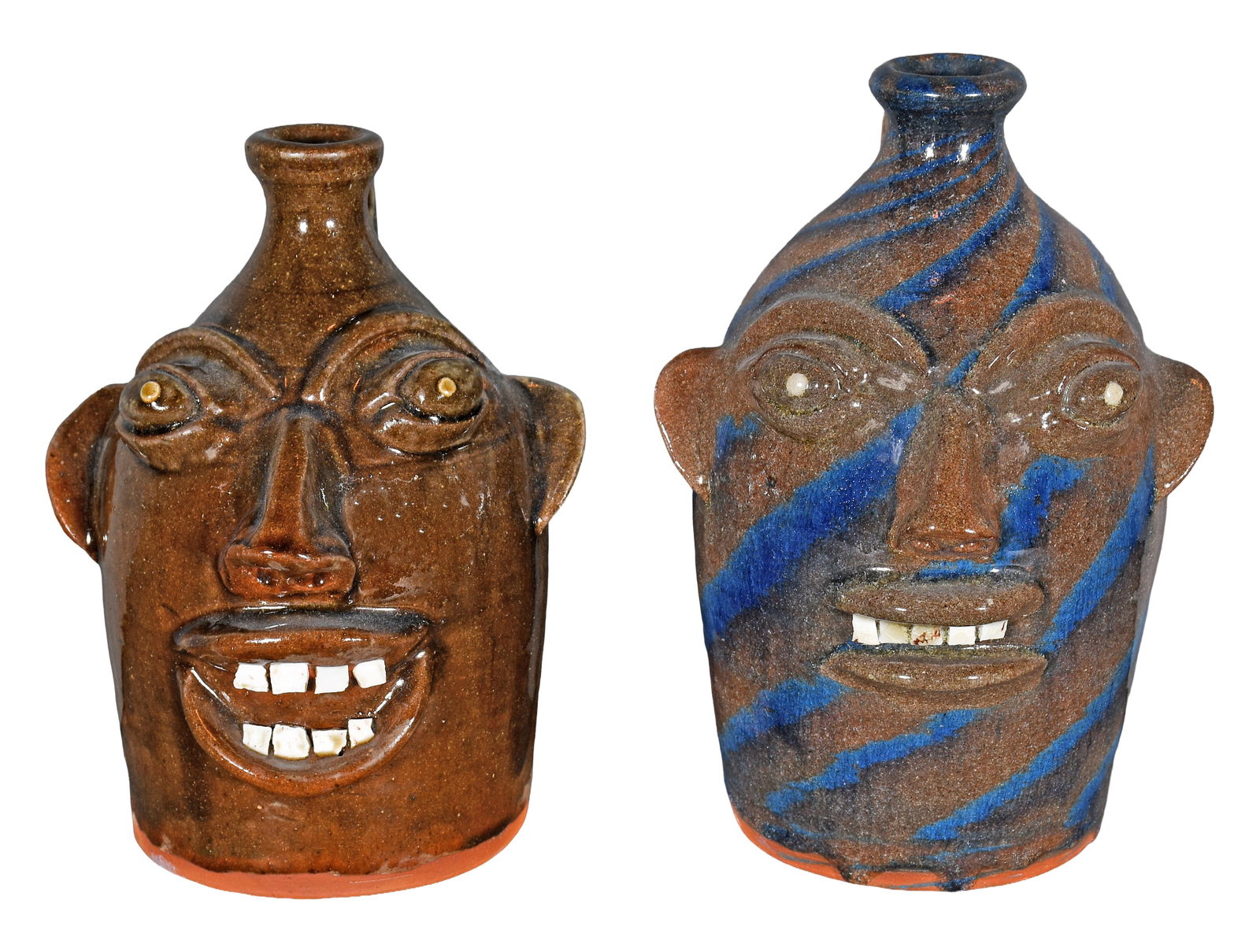 Walter Fleming. Pair of Half Gallon Face Jugs.: Walter Fleming. Pair of Half Gallon Face Jugs. Stamped. Mint condition. Average size is 8.5" h. Est. $100-200. Ship: $85 Please Read Before You Bid: By registering for and/or placing a bid in any