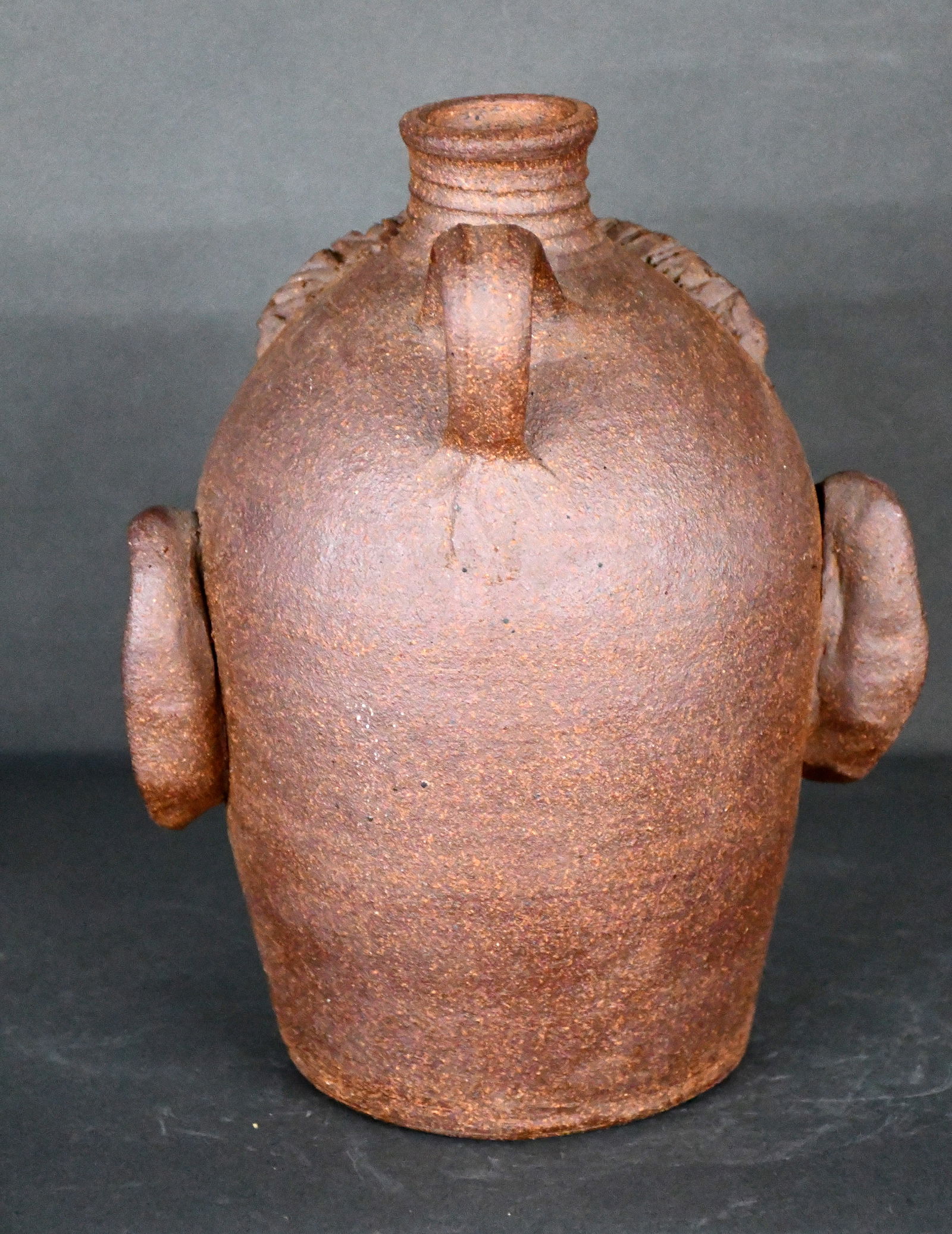 Unglazed Face Jug. - 2