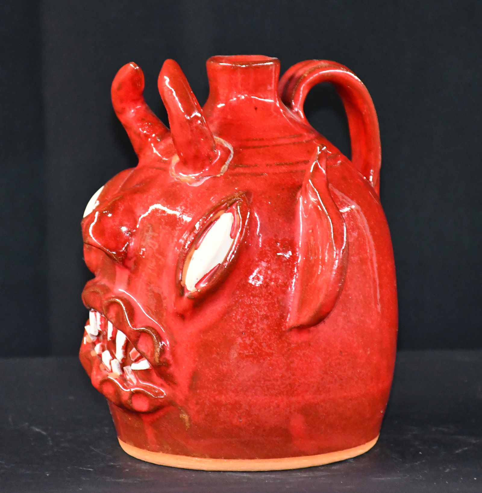 Dale Costner. Red Devil Face Jug. - 2