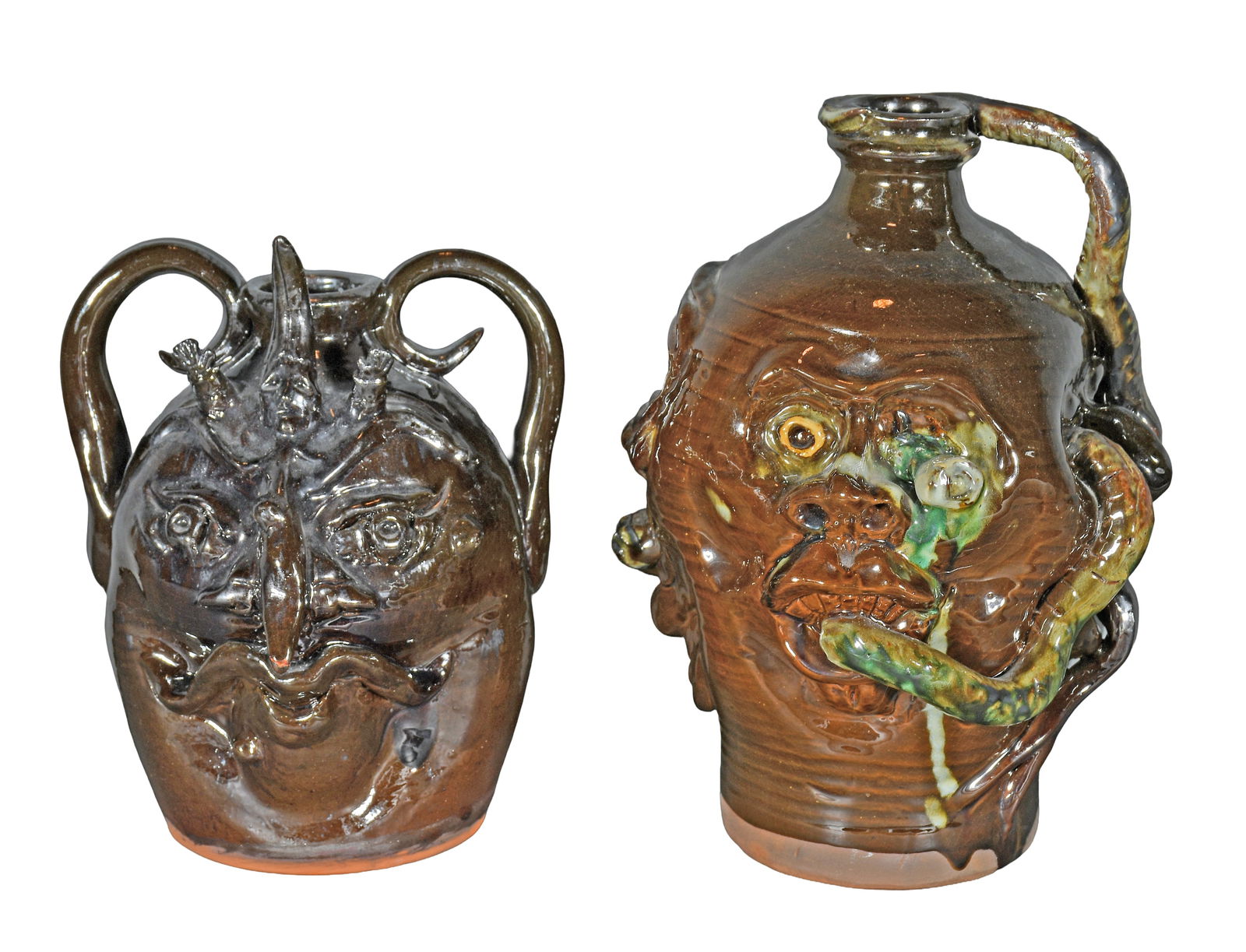 Chris Woods. Pair of Face Jugs.: Chris Woods. Pair of Face Jugs. 1992. Signed and dated. Mint condition. Tallest is 10.5" h. Est. $100-200. Ship: $85 Please Read Before You Bid: By registering for and/or placing a bid in any