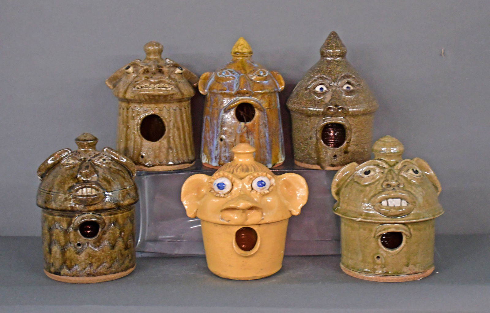 Fleming, Abee, Brown, Bayne. 6 Face Jug Birdhouses.: Fleming, Abee, Brown, Bayne, and others. Group of Six Face Jug Birdhouses. All signed. Mint condition. Average is 9" h. Est. $300-500. Ship: $200 Please Read Before You Bid: By registering for and/or