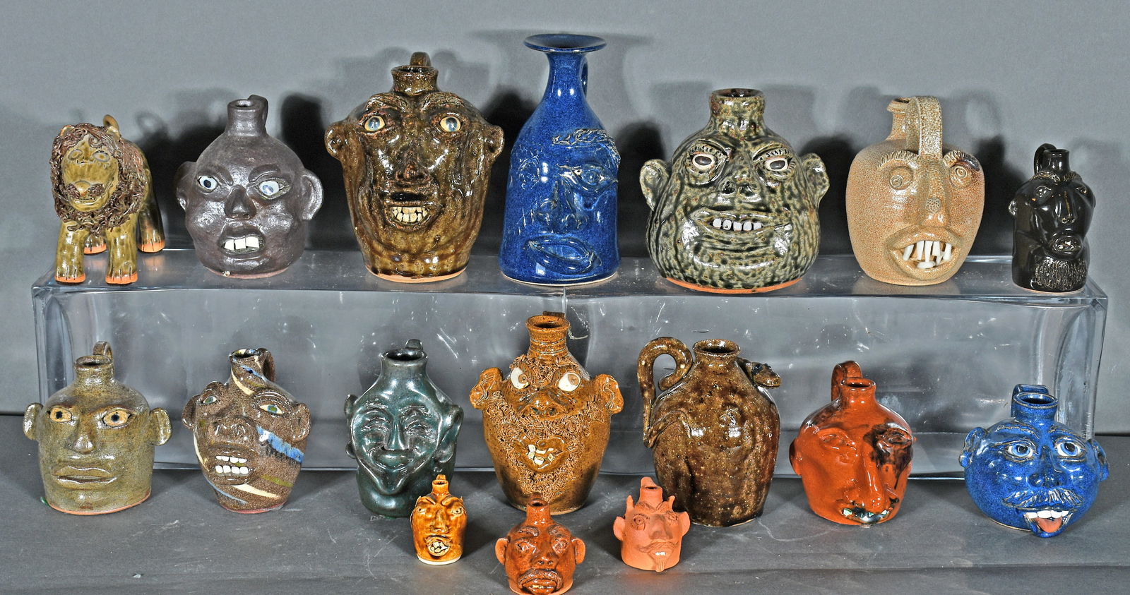 17 Half Pint and Mini Face Jugs. (1 of 2)