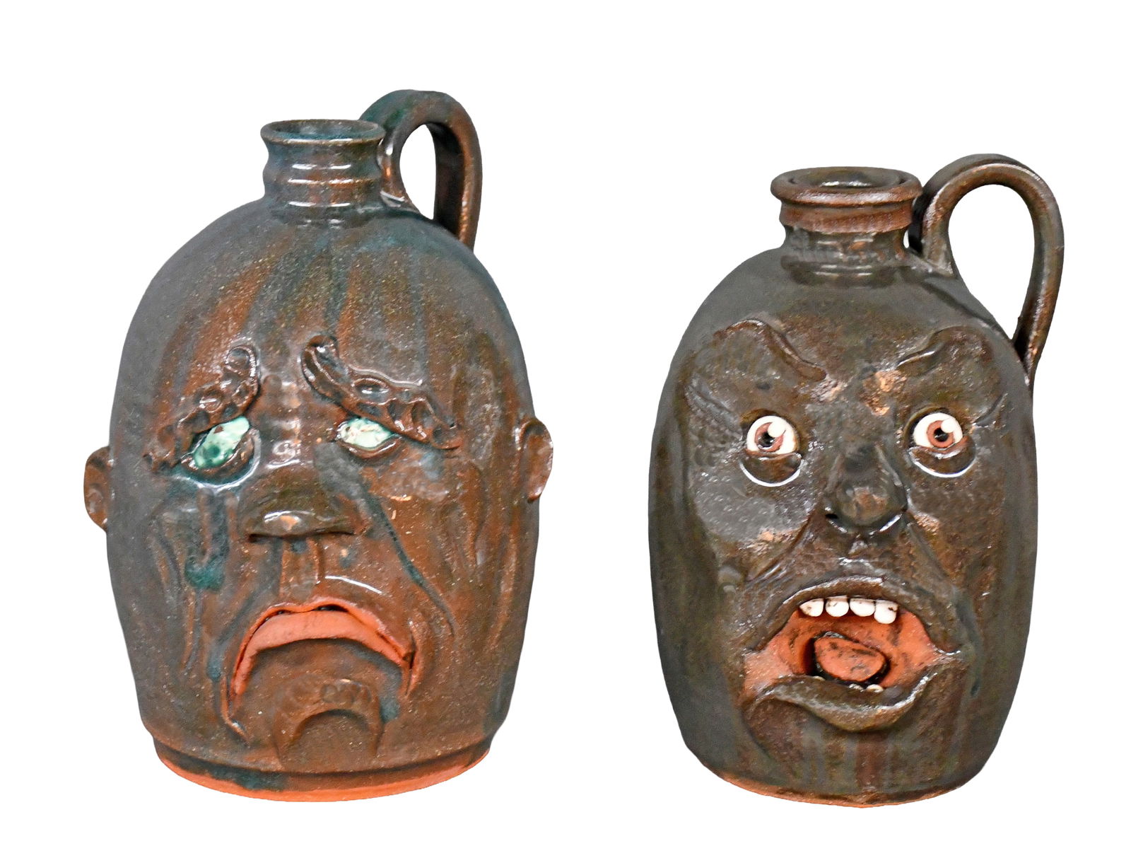 Yvette Lepley. Pair of Face Jugs.: Yvette Lepley. Pair of Face Jugs. #266, #346. Signed and numbered. Mint condition. Largest is 6.5" h. Est. $50-100. Ship: $75 Please Read Before You Bid: By registering for and/or placing a bid in