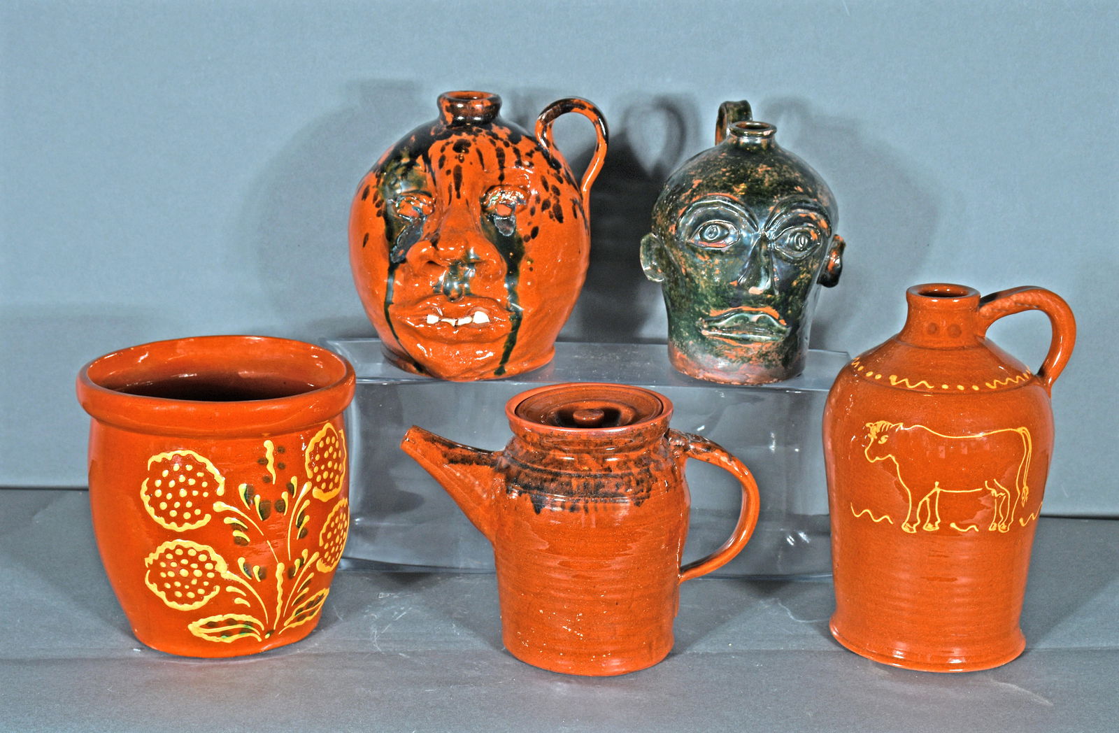 Variety of Turtle Creek Potters. 6 Half Gallon Face Jugs.: Variety of Turtle Creek Potters. Group of Six Half Gallon Face Jugs. All are signed. Mint condition. Average size is 6" h. Est. $50-100. Ship: $150 Please Read Before You Bid: By registering for
