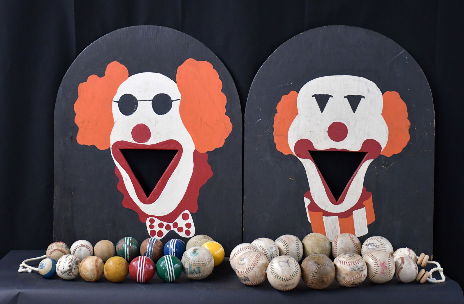 Sideshow Clown Ball Toss.: Anonymous. Sideshow Clown Ball Toss. Not signed. Paint on board with mixed group of balls. Good condition. 24" w x 29" h each. Est. $100-200. Ship: $125 Please Read Before You Bid: By registering
