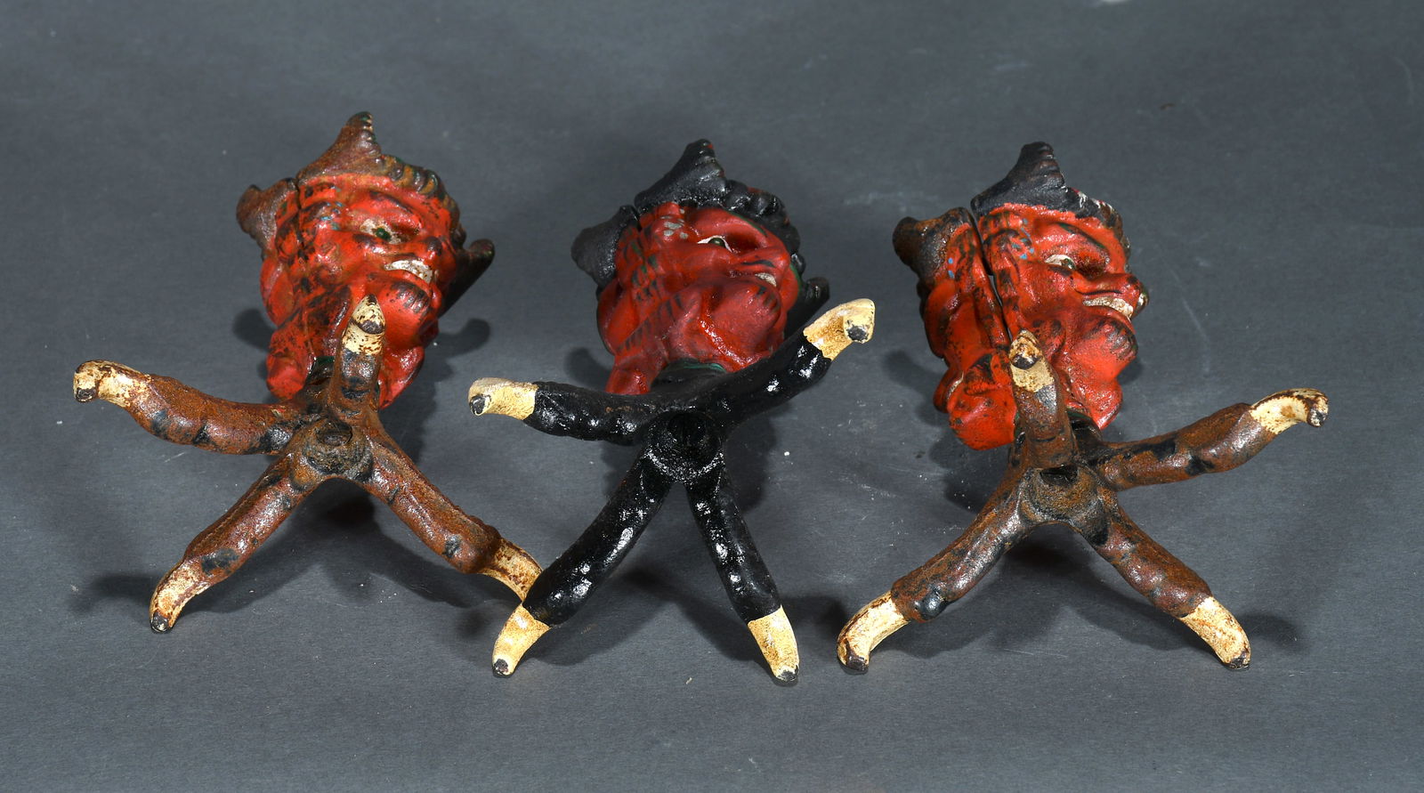 3 Devil Double Face Clawfoot Whatnots. - 3