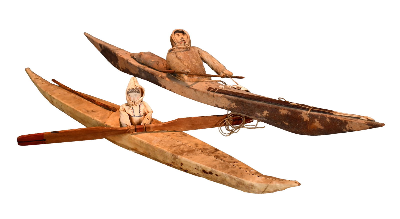 Pair of Inuit Kayakers with Paddles and Spears.: Inuit. Pair of Kayakers with Paddles and Spears. Natural hides and fur with mixed media. Great condition. 31" long average each. Est. $300-500. Ship: $85 Please Read Before You Bid: By registering for