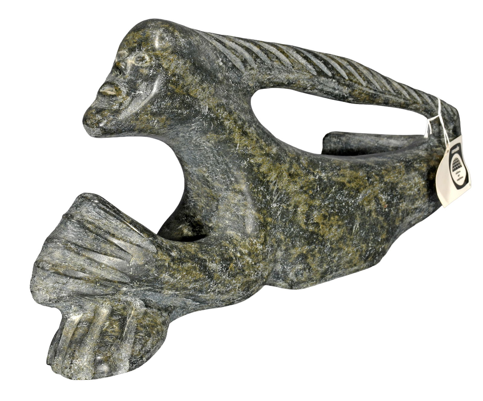 Pauloosie Tilugak. Reclining Inuit Mermaid.: Pauloosie Tilugak. Reclining Mermaid. Initialed. Carved serpentine. Excellent condition. 18" w x 10" h. Est. $100-300. Ship: $85 Please Read Before You Bid: By registering for and/or placing a bid