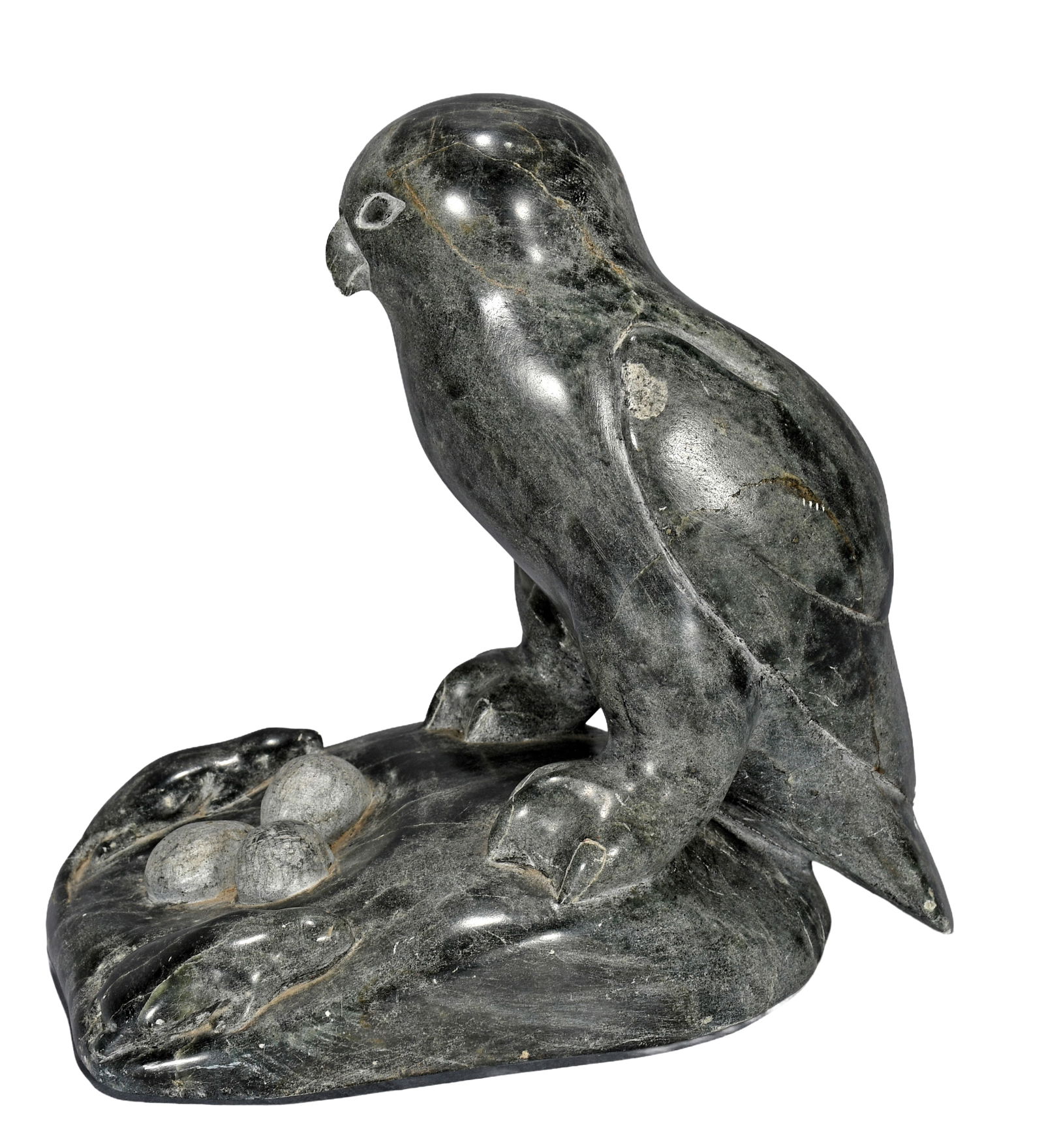 Paulouse Sivuak. Inuit Falcon.: Paulouse Sivuak. Falcon. Signed. Carved serpentine. Minor wear, otherwise excellent condition. 9" w x 9" h. Est. $100-300. Ship: $85 Please Read Before You Bid: By registering for and/or placing a