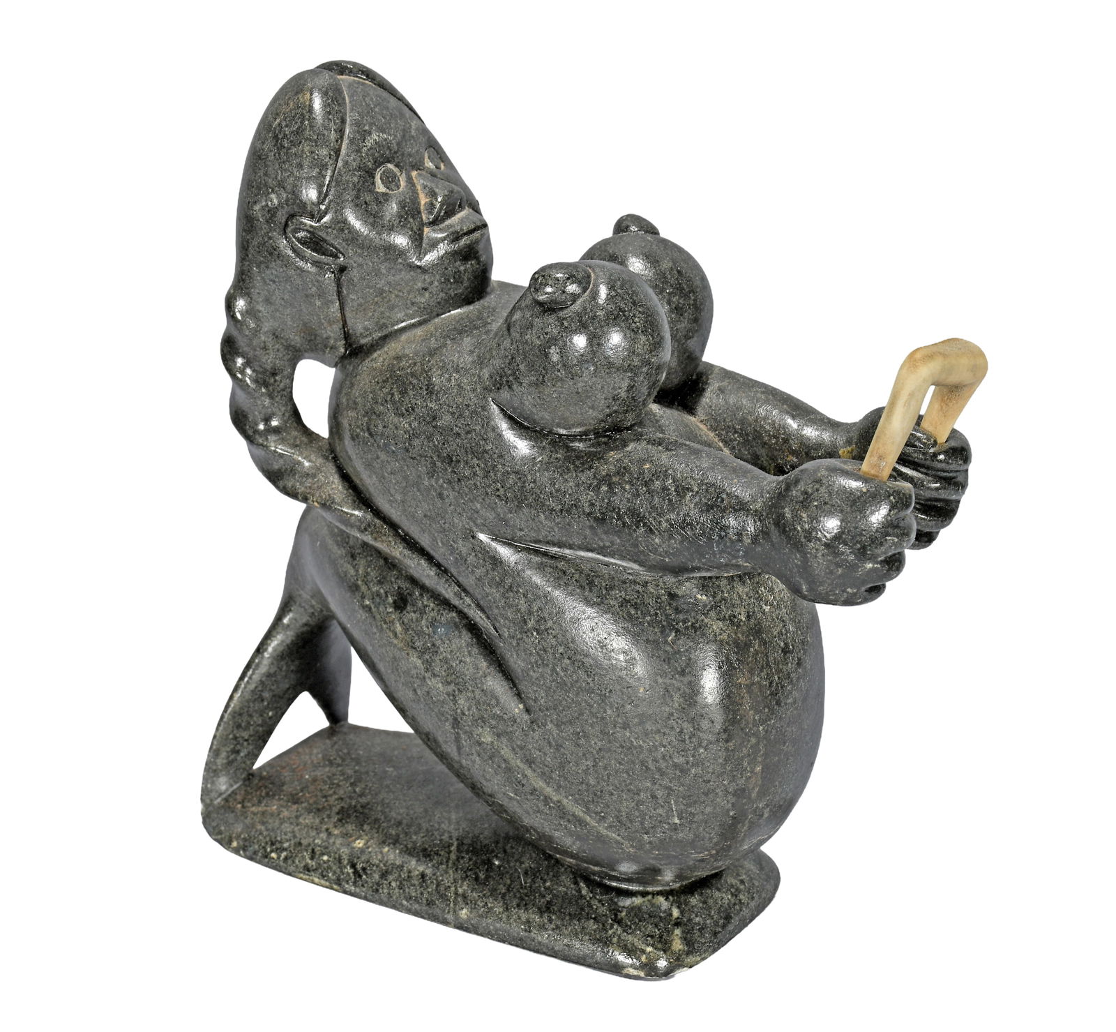 Inuit Mermaid with Incredible Ponytail.: Inuit. Mermaid with Incredible Ponytail. Signed. Carved serpentine with bone. Excellent condition. 8" w x 10" h. Est. $100-300. Ship: $85 Please Read Before You Bid: By registering for and/or