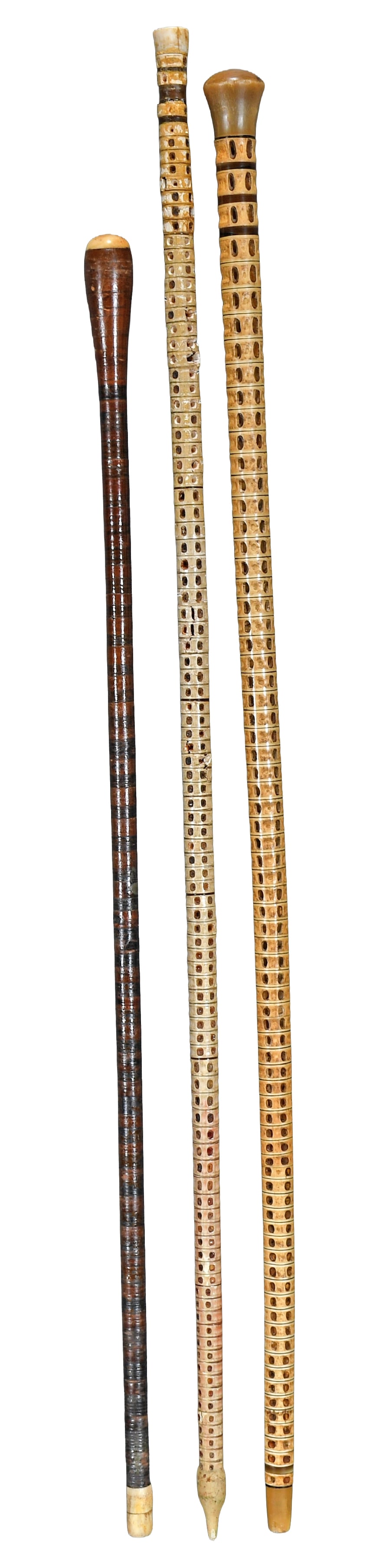 3 Shark Vertabre Canes.: Anonymous. 3 Shark Vertebra Canes. Vertebra assembled with mixed media canes. Minor wear and some loss on one cane. otherwise good condition. Largest is 36" h. Est. $200-300. Ship: $65 Please Read