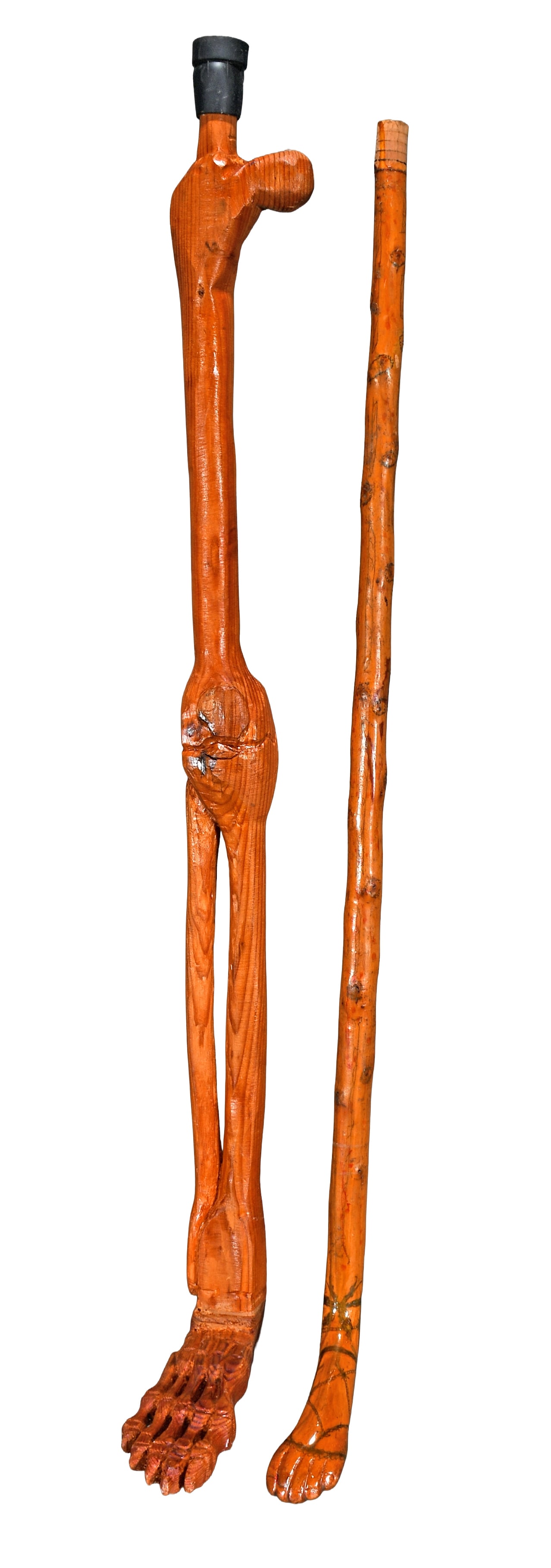 Pair of Foot Canes.: Anonymous. Pair of Foot Canes. Carved and stained wood. Minor wear, otherwise good condition. Average size is 34" h. Est. $200-300. Ship: $65 Please Read Before You Bid: By registering for and/or