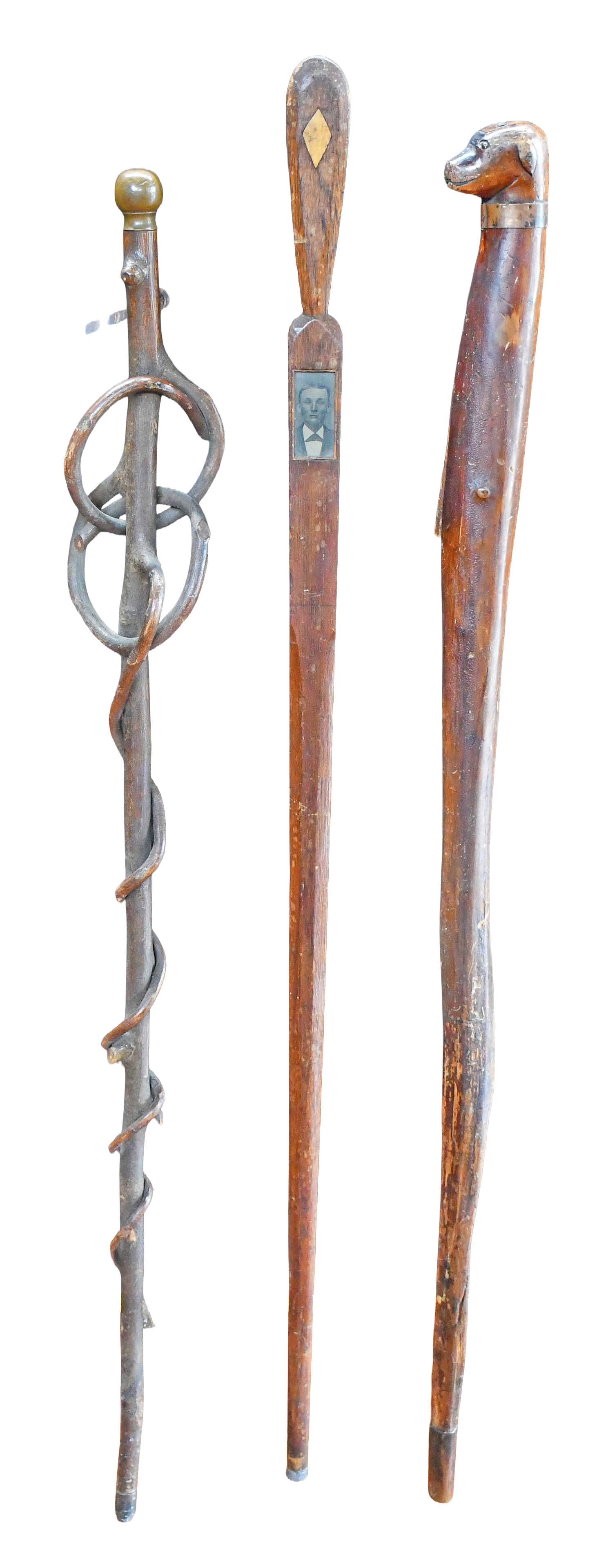 Three Anonymous Canes.: Anonymous. Three Canes. c. 1900. Carved wood with inlay photo and mixed media. Average size is 36" h. Good to fair condition. Est. $200-300. Ship: $85 Please Read Before You Bid: By registering