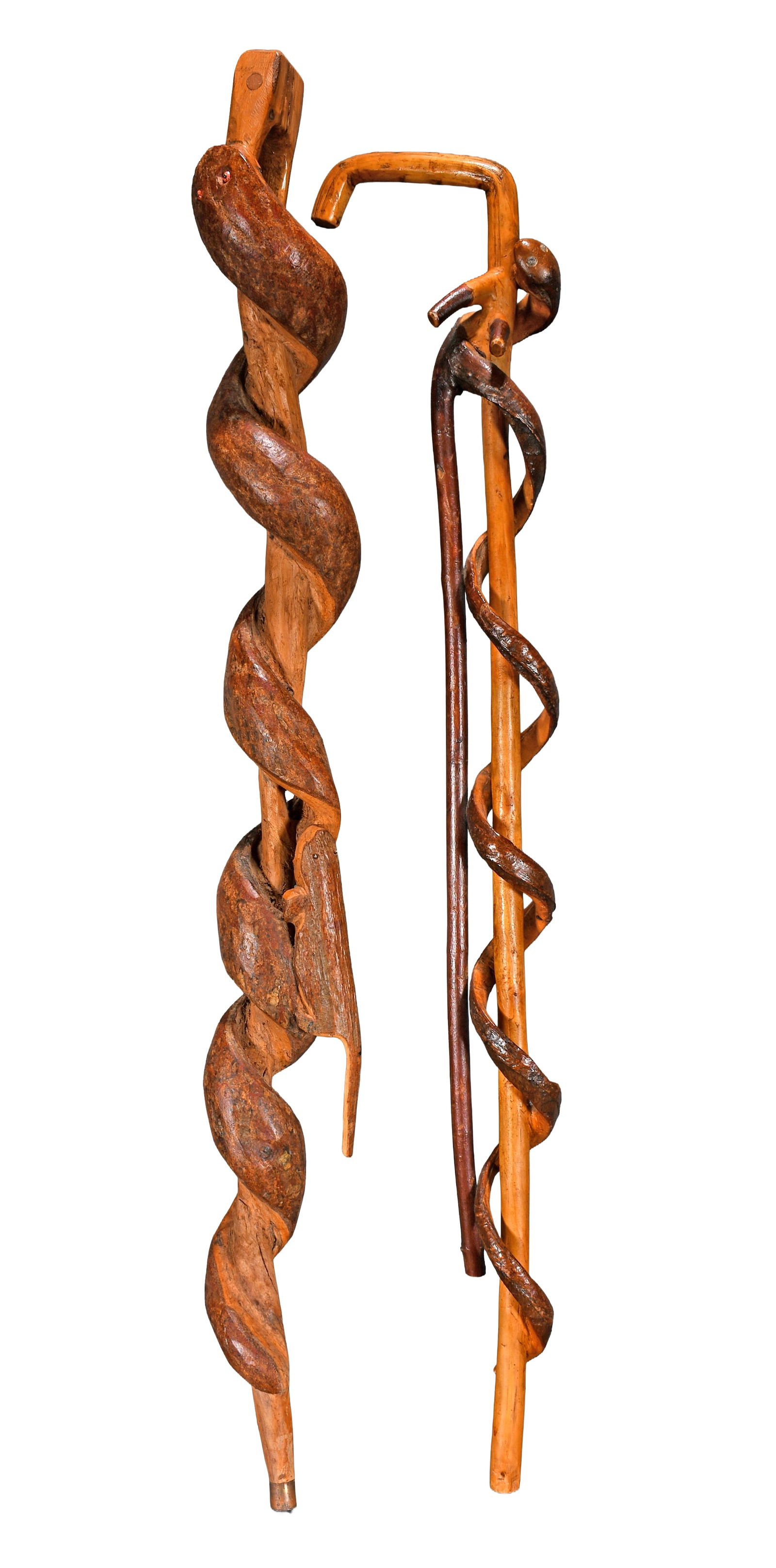 Robert Lipe. Pair of Natural Wood Snake Canes.: Robert Lipe. Pair of Natural Wood Snake Canes. Signed. Carved natural vine and wood with jeweled eyes. Excellent condition. Largest is 44" h. Provenance: Larry Hackley. Est. $200-300. Ship: $100 Pleas