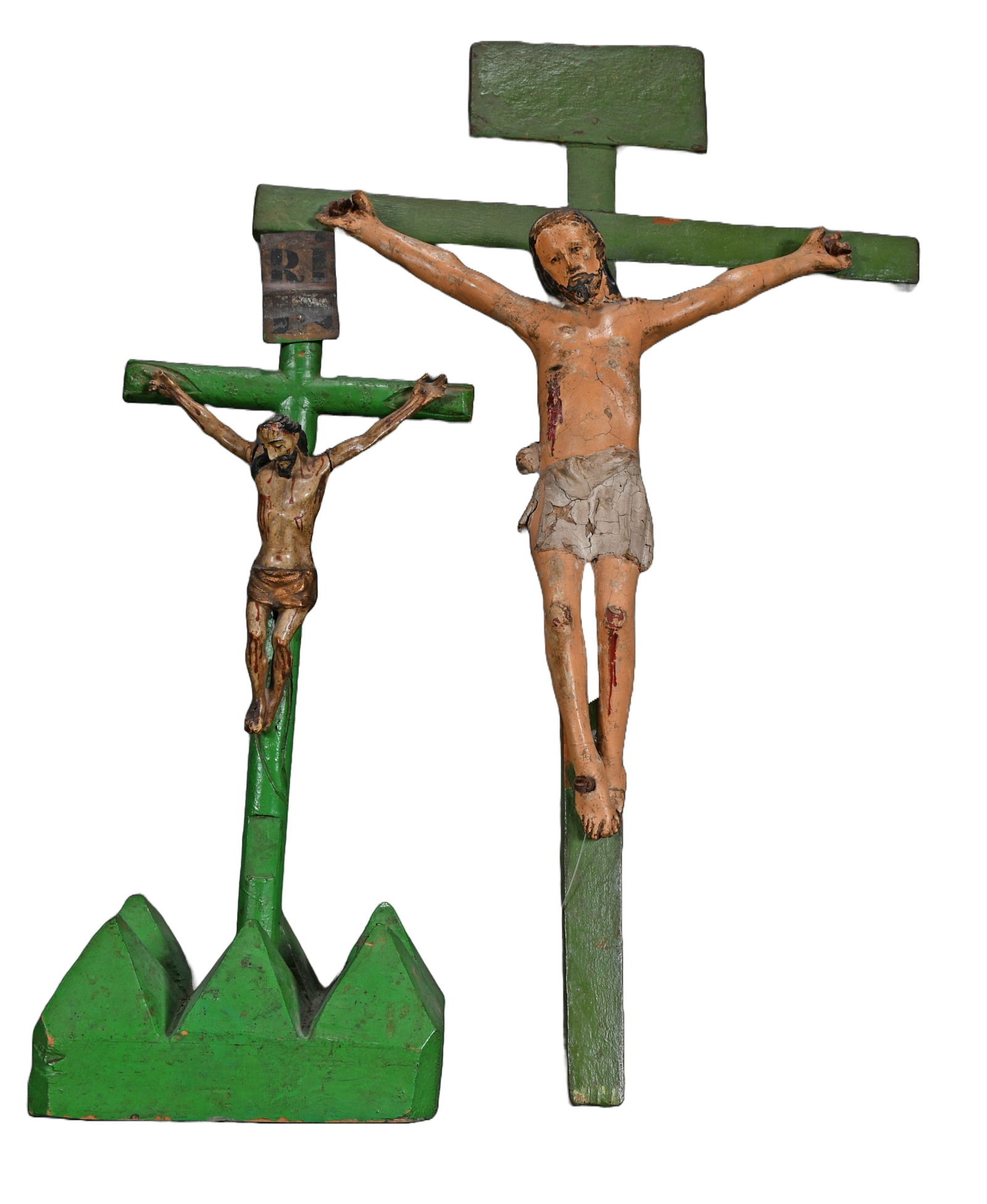 Pair of Crucified Christ Figures.: Anonymous. Pair of Crucified Christ Figures. c. late 19th to early 20th c. Carved wood with gesso and paint. Minor loss and crazing of paint and gesso, otherwise good condition. Tallest is 14.5" h x