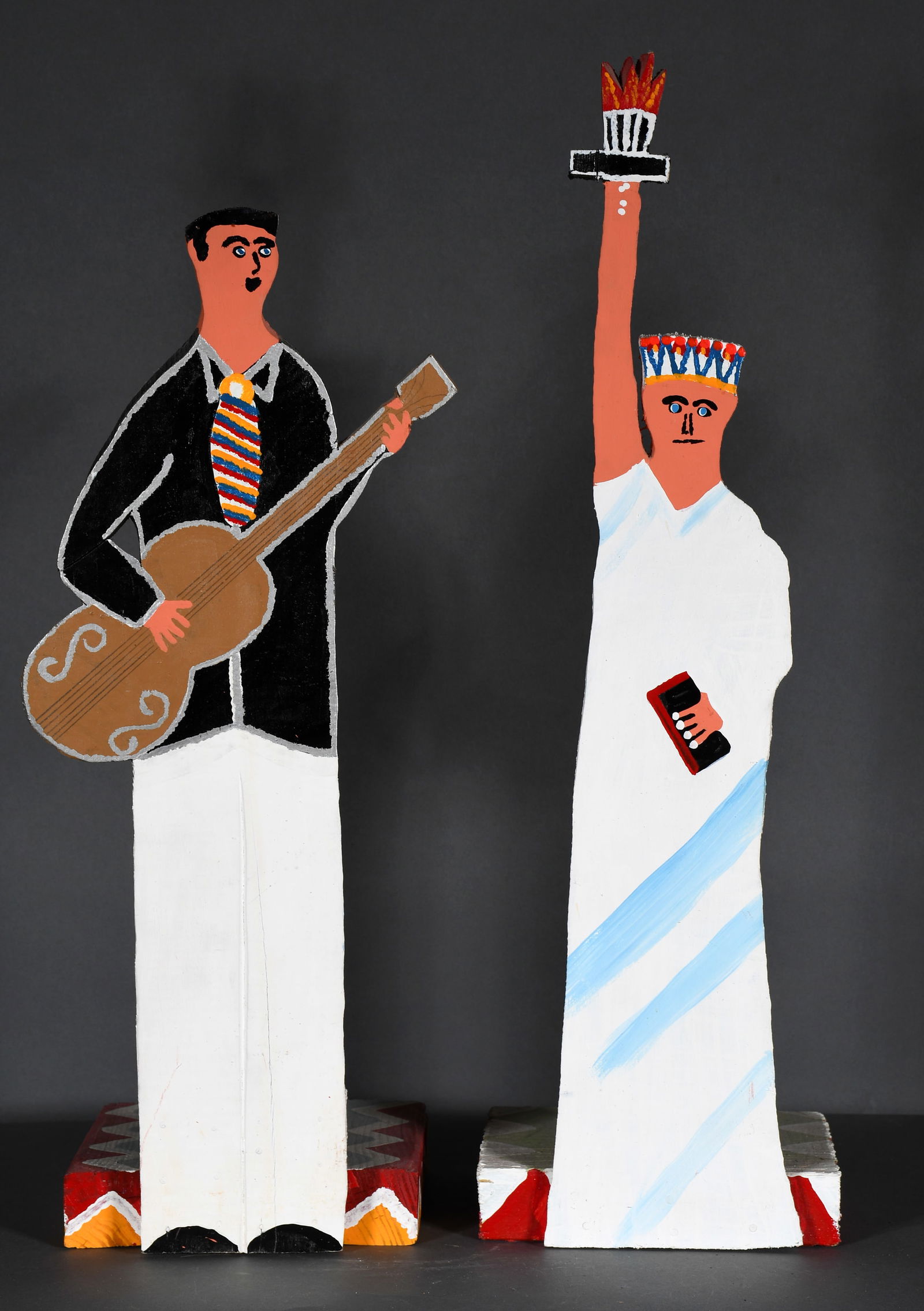 James Harold Jennings. Liberty & Elvis Pair of Standing Cutouts: James Harold Jennings. Liberty and Elvis Pair of Standing Cutouts. Not signed. Paint on cut out wood attached to painted bases. The torch on Liberty as been broken and repaired, otherwise great