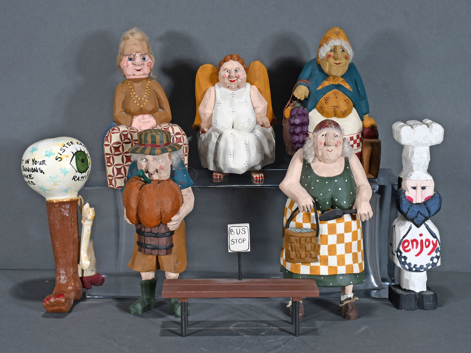 L. Koojed. Group Lot of 8 Wooden Figures. (1 of 1)