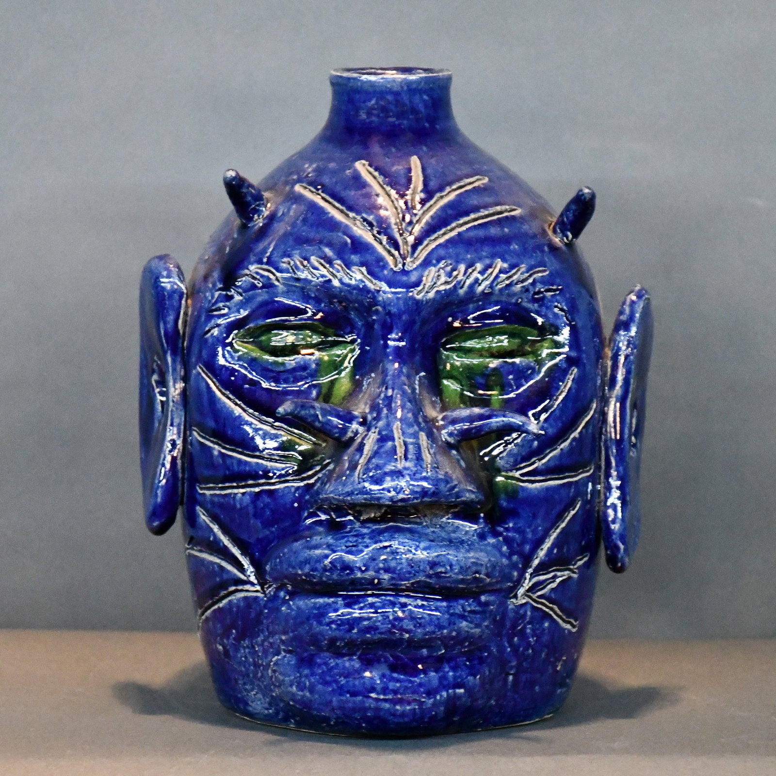 Edwin Meaders. Blue and Green Glaze Devil Face Jug. - 4