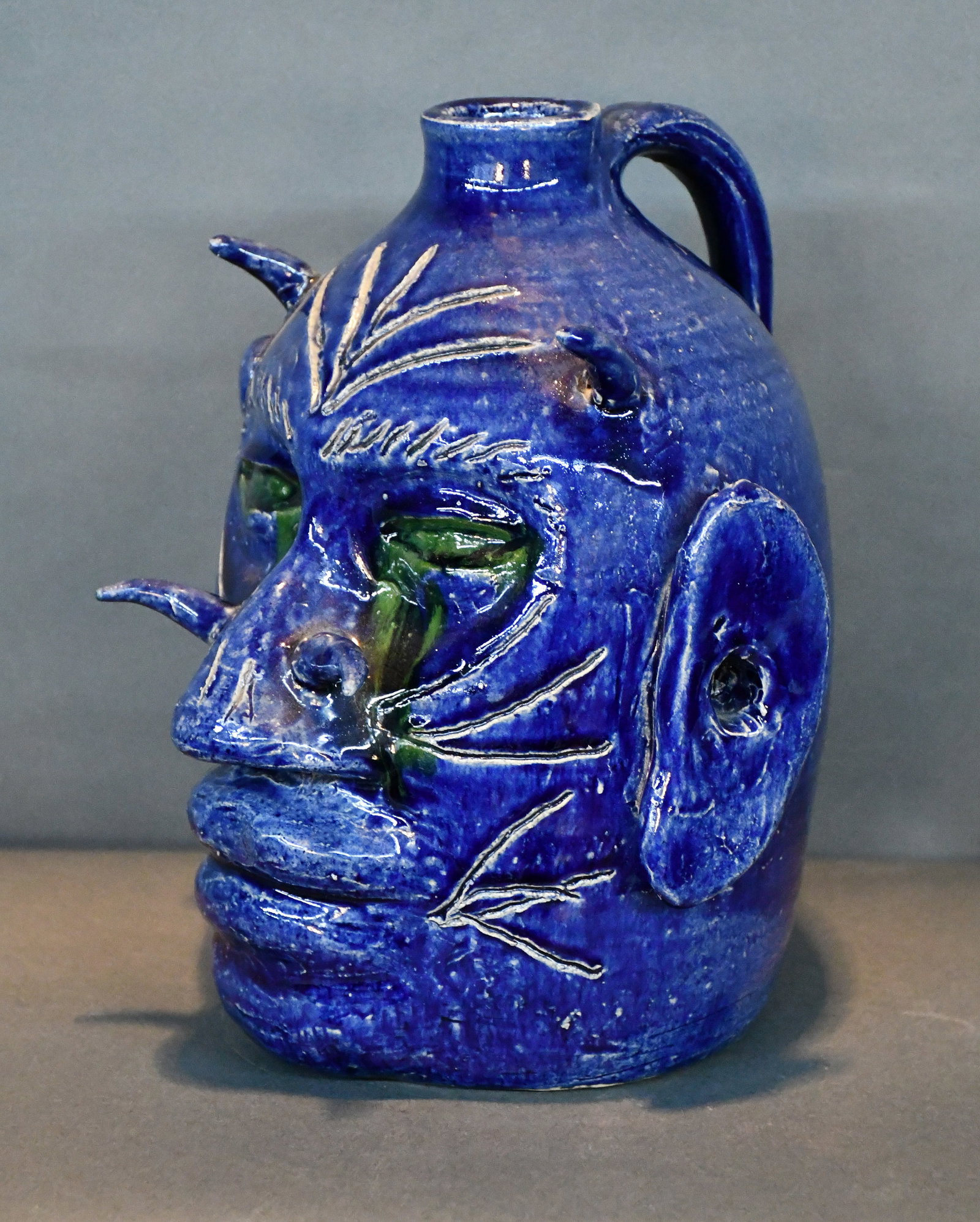 Edwin Meaders. Blue and Green Glaze Devil Face Jug. - 7