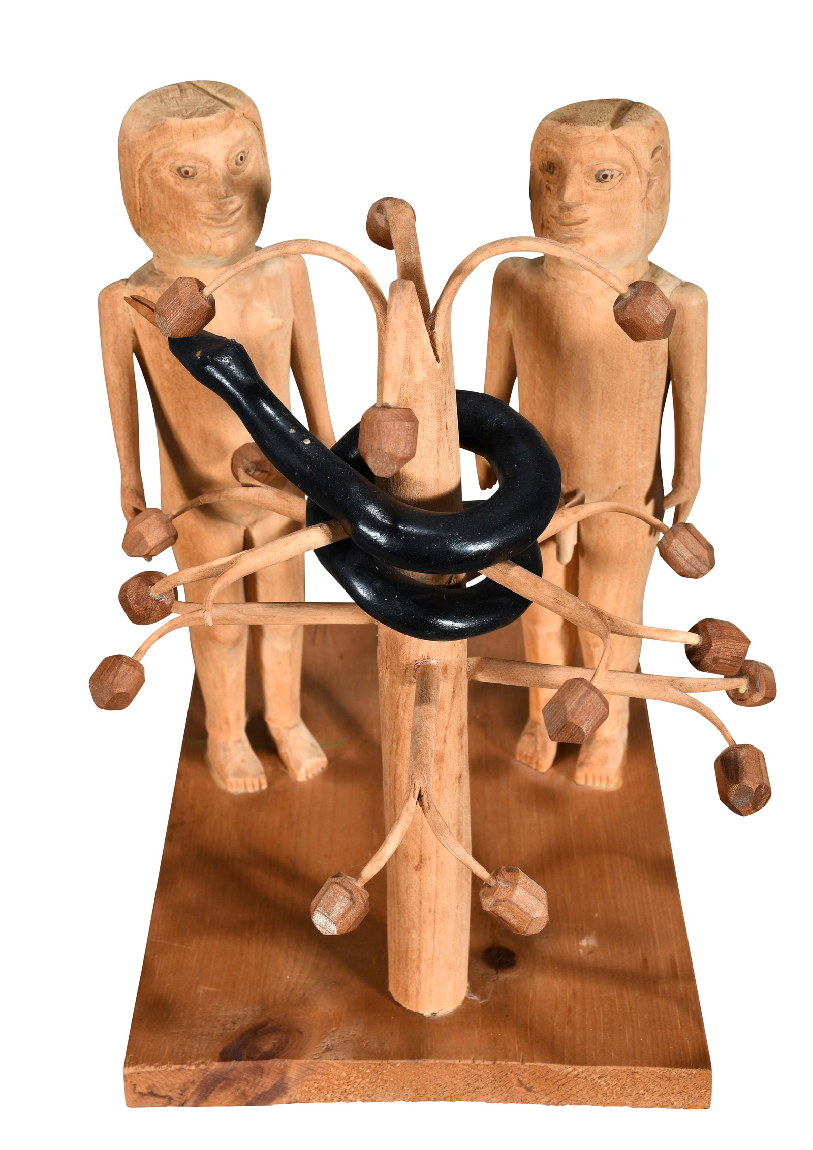 Edgar Tolson. Adam and Eve with the Serpent and the Apple Tree.: Edgar Tolson. (1904-1984). Adam and Eve with the Serpent and the Apple Tree. Signed. Carved natural wood with painted snake. One apple is re-attached, otherwise excellent condition. 11" w x 8"d x 12"