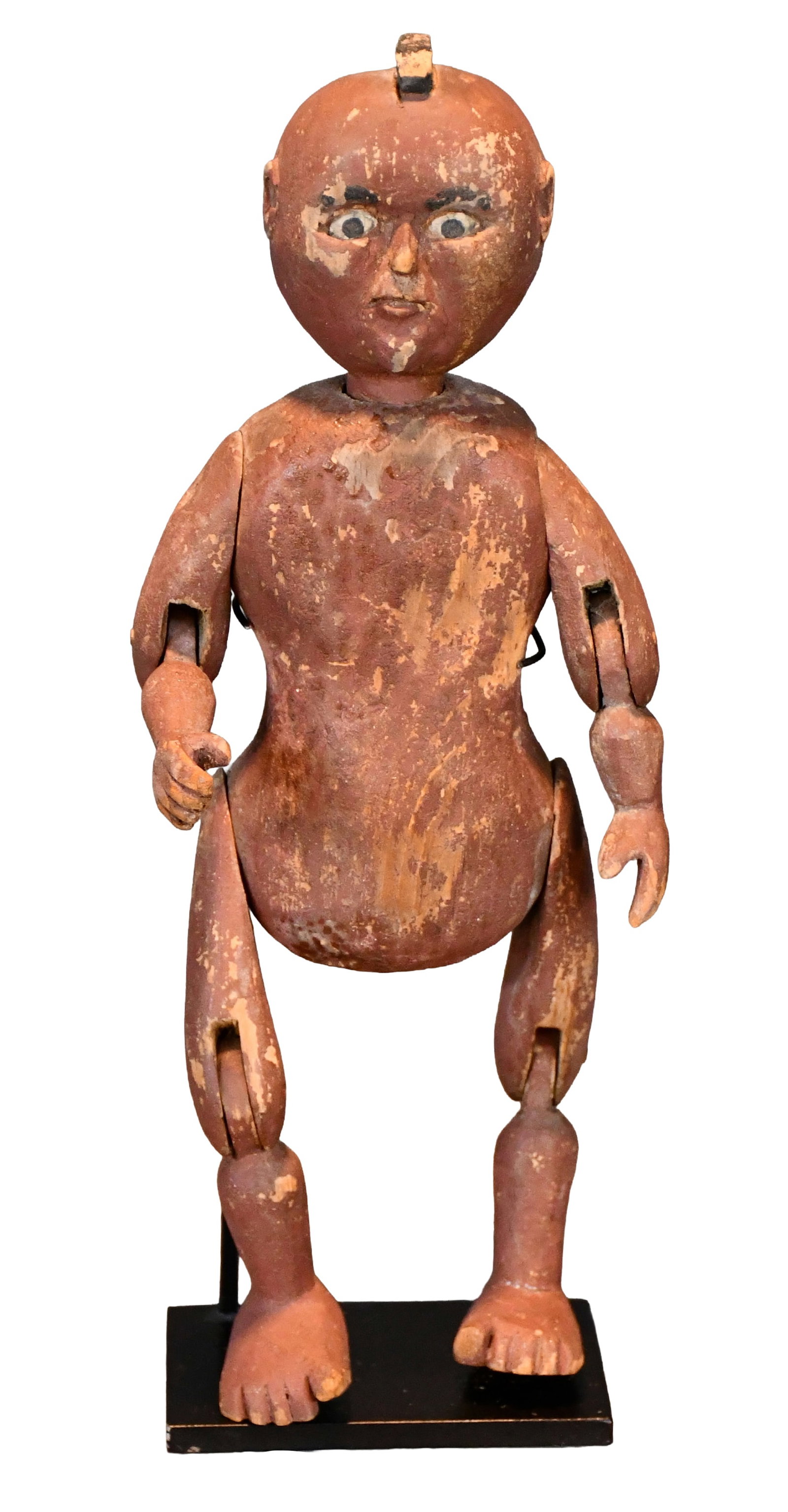 Anonymous Articulated Native American Doll.: Anonymous Articulated Native American Doll. Not signed. Carved and painted wood. Expected wear and loss to paint, otherwise good condition. Size with stand is 12" h. Est. $200-400. Ship: $45 