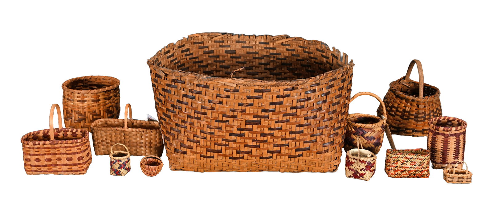 Cherokee and Choctaw 12 Baskets and Minis.: Cherokee and Choctaw 12 Baskets and Minis. River cane with natural dyes. Largest has rim issues, miniature baskets are in excellent condition. Largest is 18" w x 9" h. Est. $200-400. Ship: $65 Please