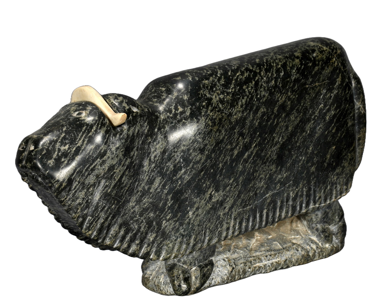 Inuit Artist. Musk Ox and Horn Carving.: Inuit Artist. Musk Ox and Horn Carving. #A524661. Initialed and numbered. Carved dark green serpentine with bone. Excellent condition. 14" w x 9" h. Est. $300-500. Ship: $85 Please Read Before You Bid