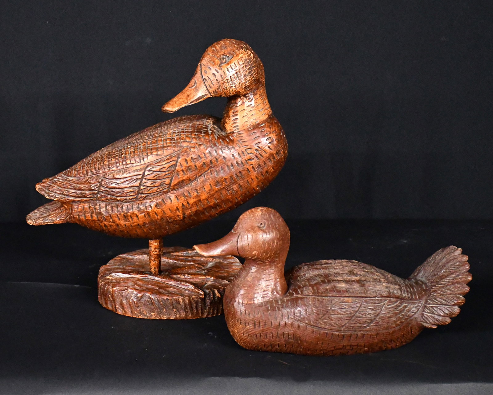 Clarence Stringfield. Pair of Ducks.: Clarence Stringfield. Pair of Ducks. Signed. Carved and stained wood. Excellent condition. Largest is 12" w x 12" h. Est. $300-500. Ship: $65 Please Read Before You Bid: By registering for and/or