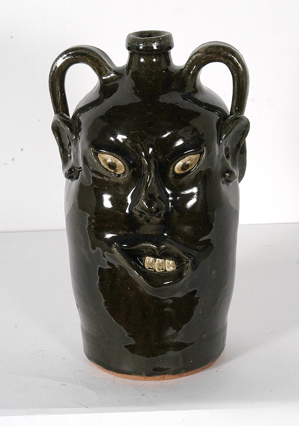 Reggie & David Meaders. Dbl Face Jug, #3. : Reggie & David Meaders. Double-Sided Face Jug, #3. Signed and numbered. Tall unique piece. Mint condition. 12”h. Est. $400-600. Ship: $55