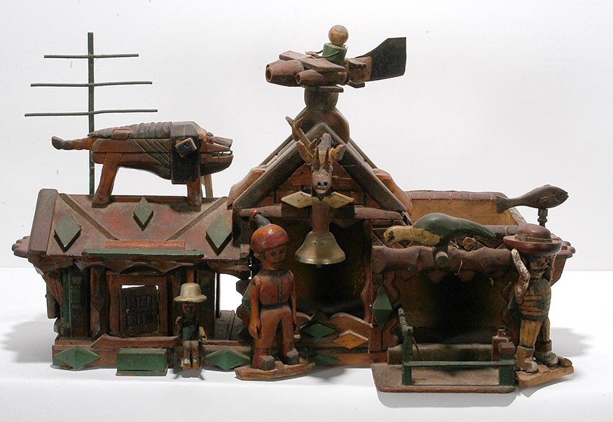 Mr. Benjamin. Homestead.: Mr. Benjamin. Homestead. Homestead includes three male figures, large dog on roof, and four weathervanes. Not signed or dated. c. 1930’s-40’s. Carved, painted and stained wood. Miner loss, otherwi