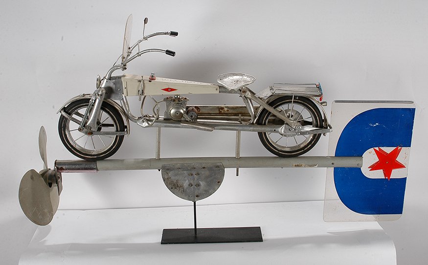 Melvin Thayer. Motorcycle Whirligig.: Melvin Thayer. Motorcycle Whirligig. Signed. Metal, tin, plastic and rubber. Excellent condition. 54”long x 34”h x 16”w. Private collection. Est. $500-800. Buyer is responsible for shipping.