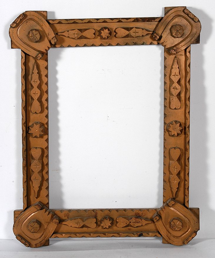 Lucky Tramp Art Frame: Tramp Art Lucky Tramp Art Frame. Crudely carved and gold painted wood frame. Excellent condition. 25” x 33”x 2.5”. Est. $400-600. Ship: $75