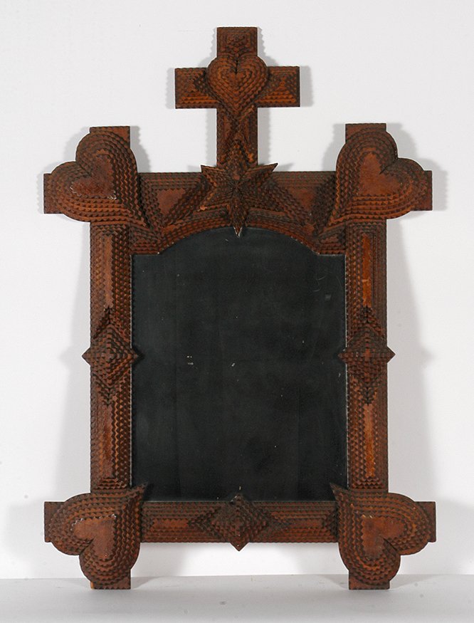 Tramp Art Frame w Hearts & Diamonds.: Tramp Art Frame With Hearts & Diamonds. Chip-carved and stain with early mirror. Minor loss, otherwise excellent condition. 27” x 39” x 2.5”. Est. $1,000-2,000. Buyer is responsible for shipping