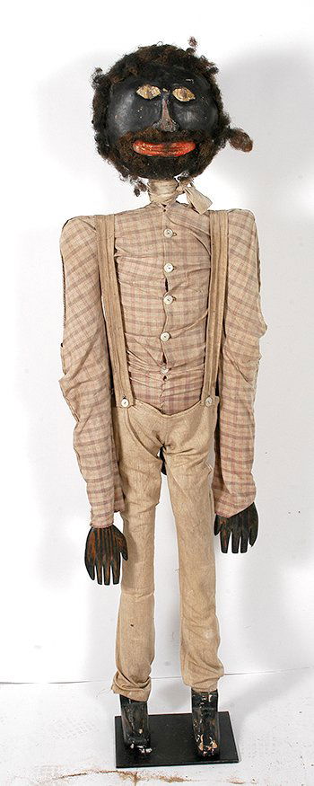 Life-Sized Black Doll.: Anonymous Life-Sized Black Doll. Painted wood with joined limbs. Hand-made period dress. Hair. Overall great condition. 18” x 10” x 66”h. Est. $1,000-2,000. Buyer is responsible for shipping.