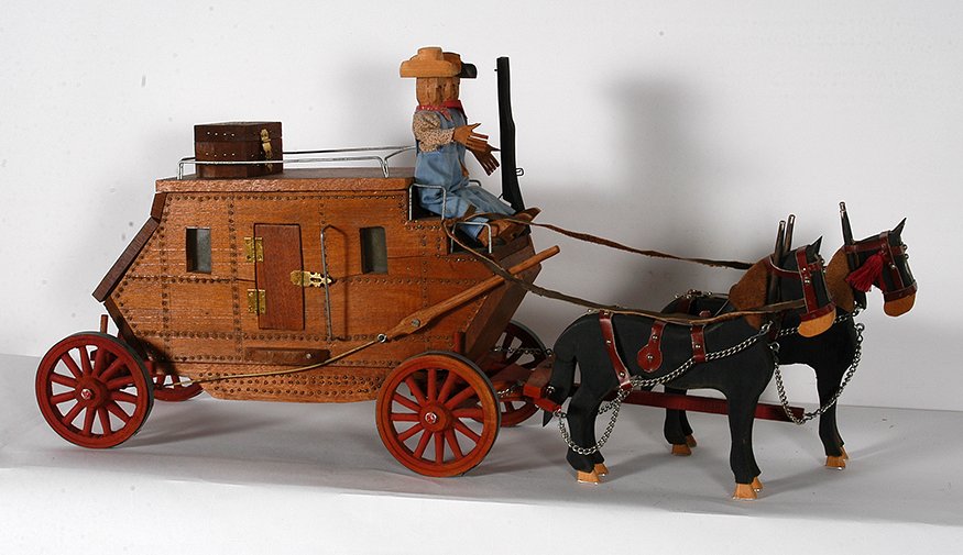 Willard Watson. Horse Drawn Stagecoach.: Willard Watson. Horse Drawn Stagecoach. 1989. Deep Gap, NC. We didn't see a signature originally, but there is a faint signature in reddish pencil on the bottom of the stage coach. Carved and painted 