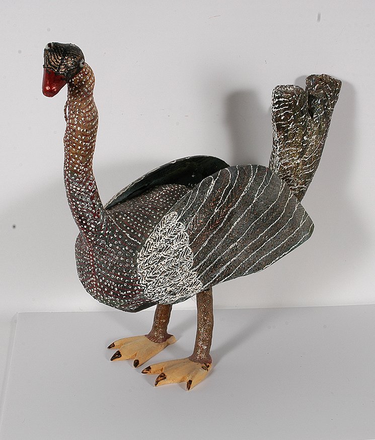 O.L. Samuels. Swan.: O.L. Samuels. Swan. Initialed. Not dated. Carved wood with glitter, marble eyes. Excellent condition. 9” x 27” x 23”h. Featured in Kathy Moses’ Outsider Art Of The South. Est. $200-400. Ship: 