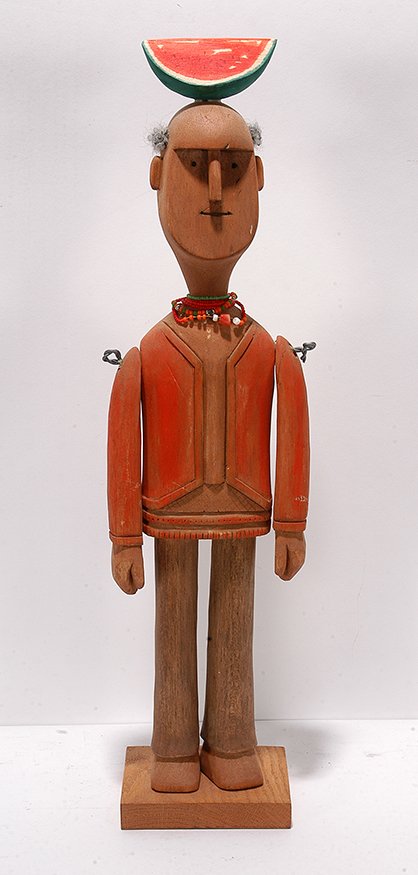 Susan Marshall. Watermelon Man.: Susan Marshall. Watermelon Man. 1993. Signed and dated. Carved and painted wood with mixed media. Excellent condition. Illustrated in Wos Up Man. 22” x 5” x 4.5”. Est. $200-300. Ship: $55