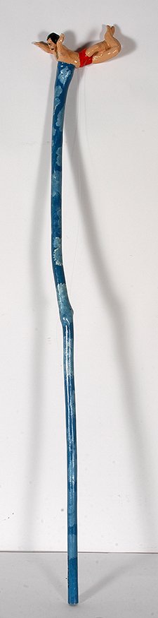 Junior Lewis. Olympic Swimmer Mark Spitz.: Junior Lewis. Olympic Swimmer Mark Spitz (this was originally titled Cliff Diver, but it is actually Mark Spitz complete with gold medal around his neck. 1996. Signed and dated. Carved and painted sti
