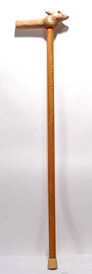 Ed Paschke. Animal Head Cane.: Ed Paschke. Animal Head Cane. Signed. Carved wood with glass eyes. Excellent condition. 37.5”h. Est. $100-200. Ship: $55